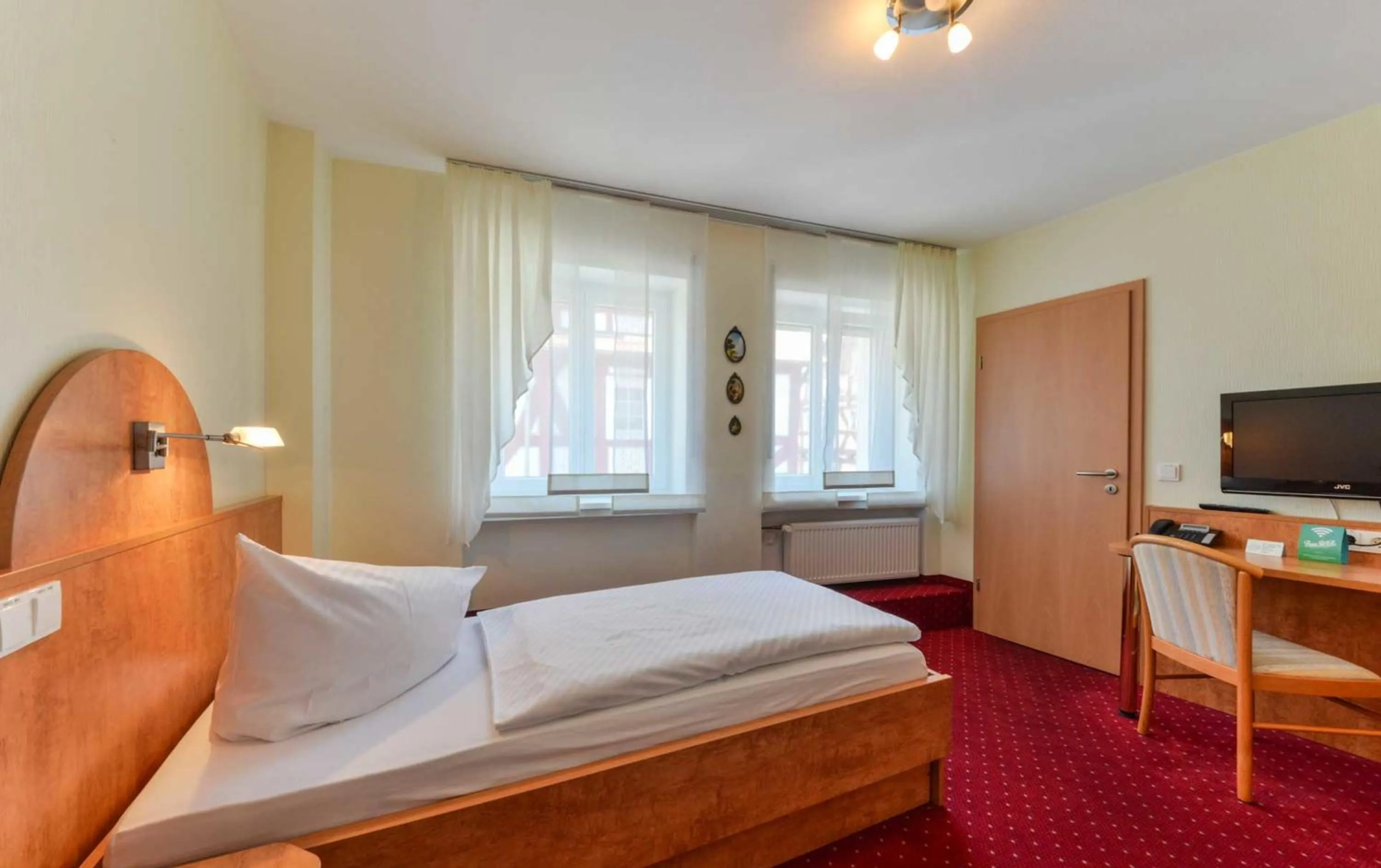 Bed in Hotel Kirchhainer Hof