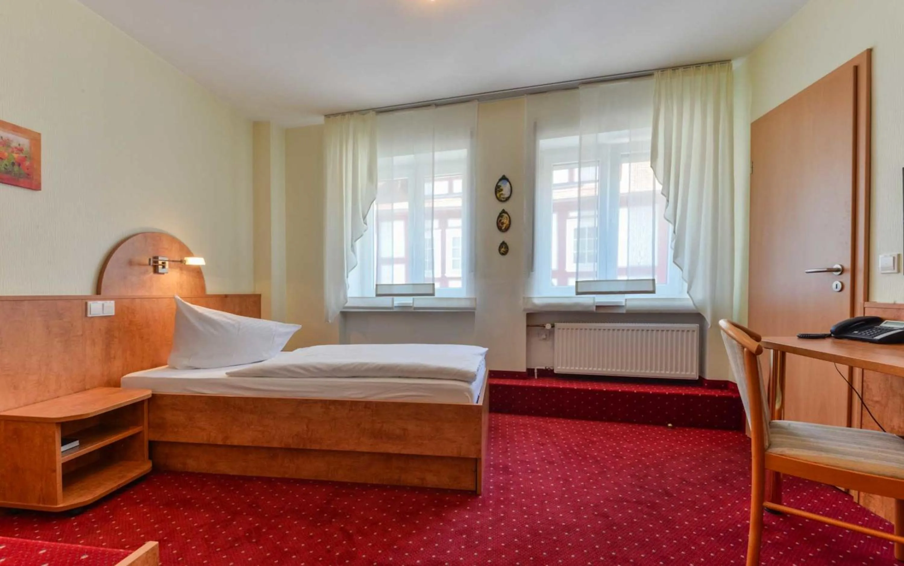 Bed in Hotel Kirchhainer Hof