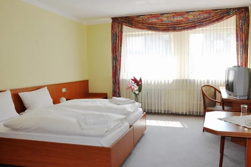 Photo of the whole room, Bed in Hotel Hessischer Hof
