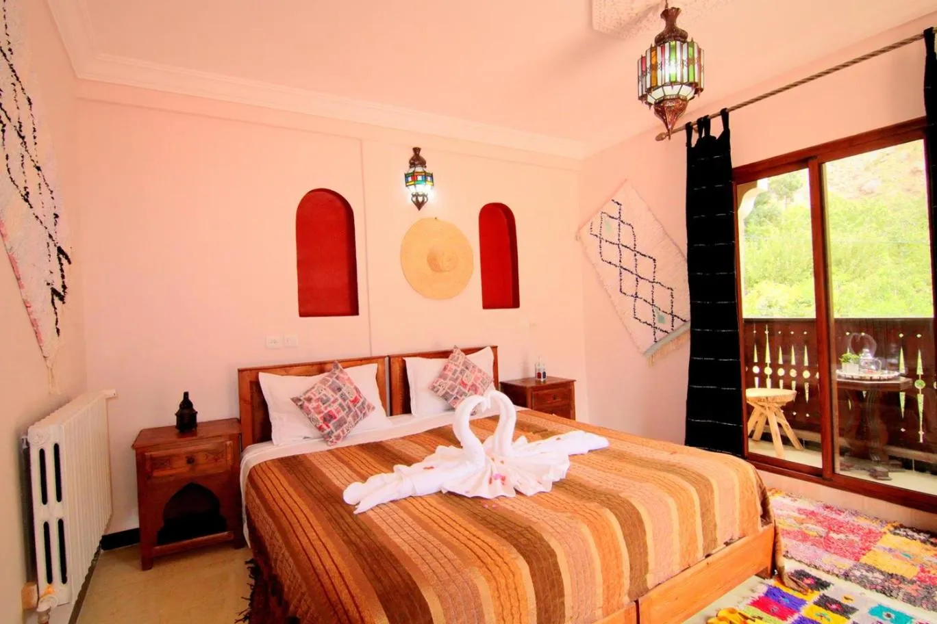 Photo of the whole room, Bed in Jnane Karma