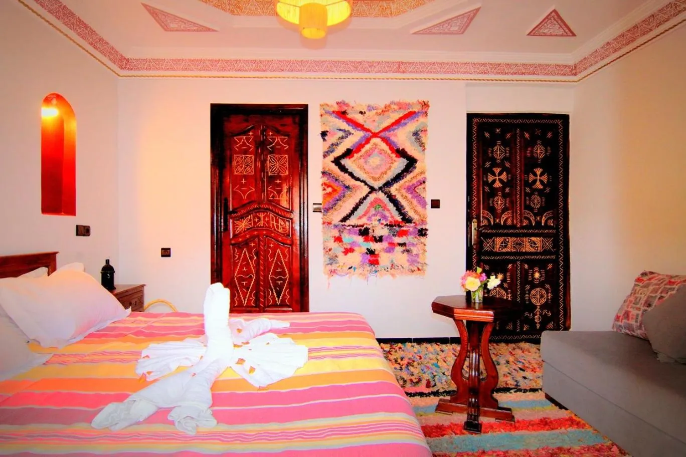 Photo of the whole room, Bed in Jnane Karma