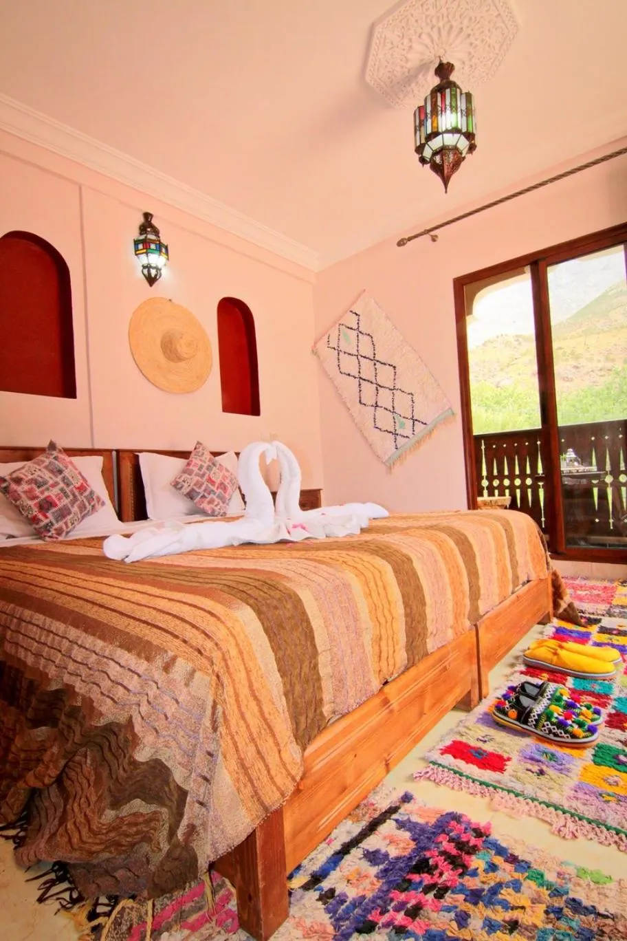 Photo of the whole room, Bed in Jnane Karma