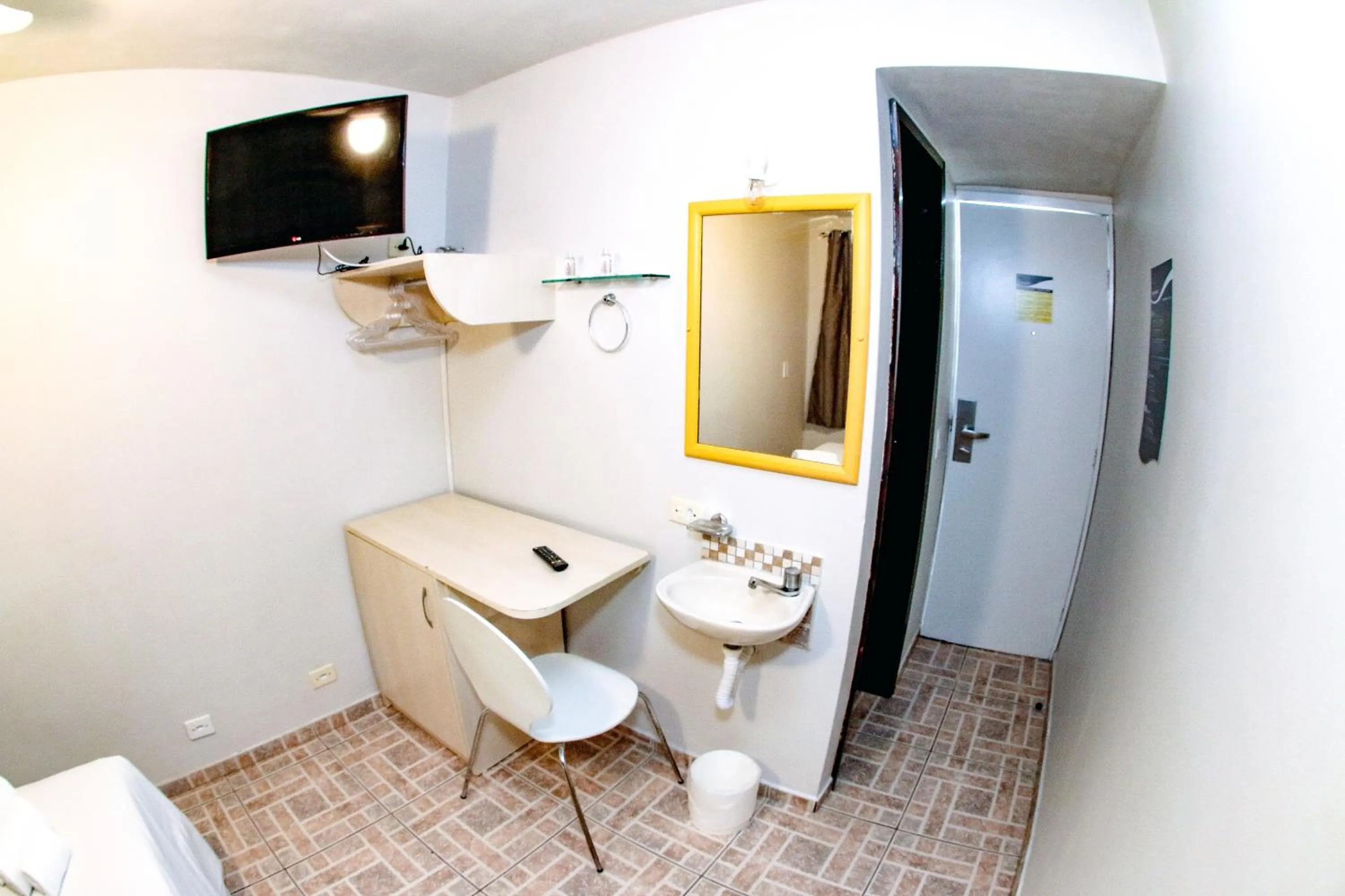 Bedroom in Esquina Batel - Hotel Econômico