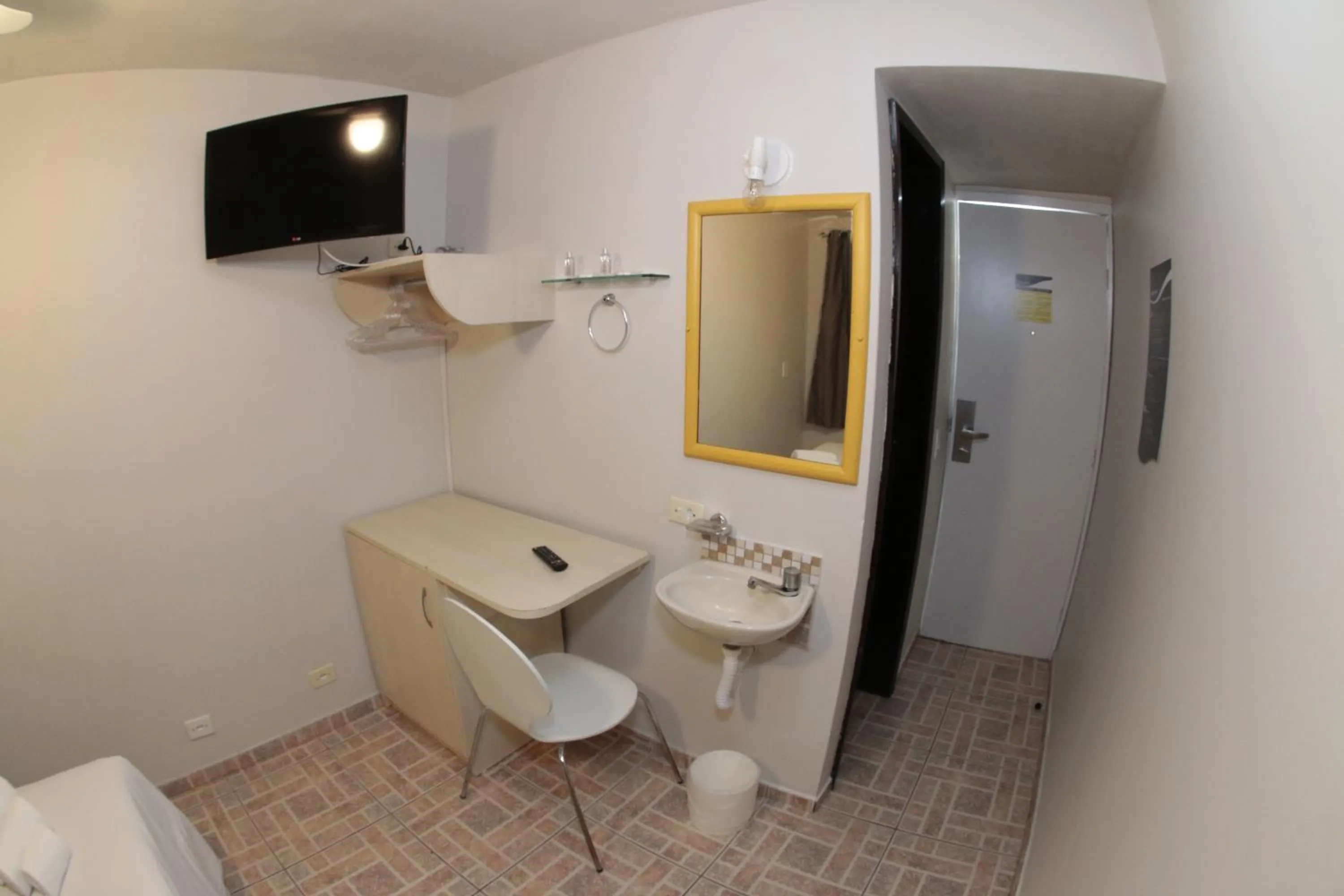 Bedroom in Esquina Batel - Hotel Econômico