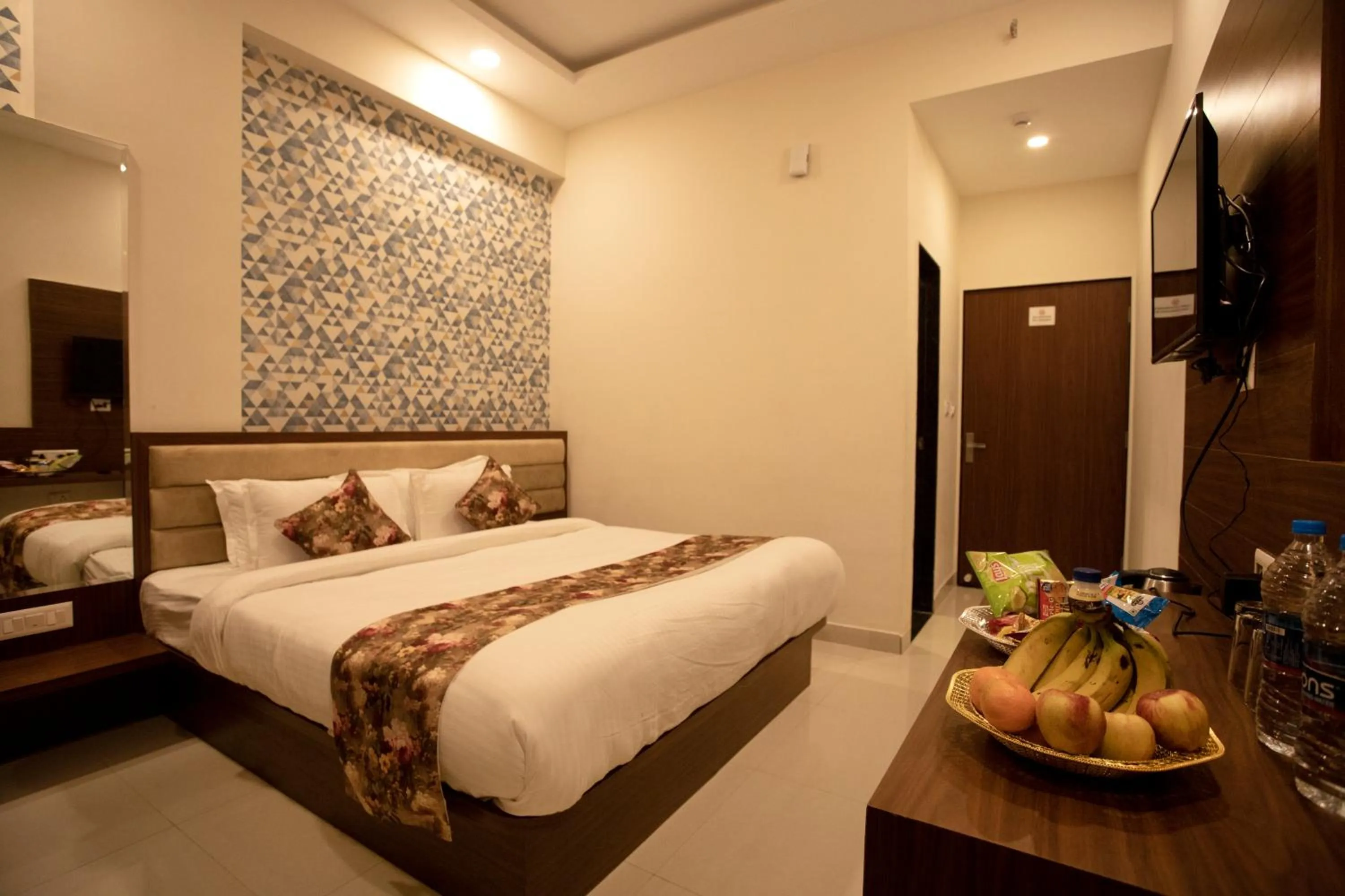 Photo of the whole room, Bed in Hotel Bhairav Bagh with Swimming Pool