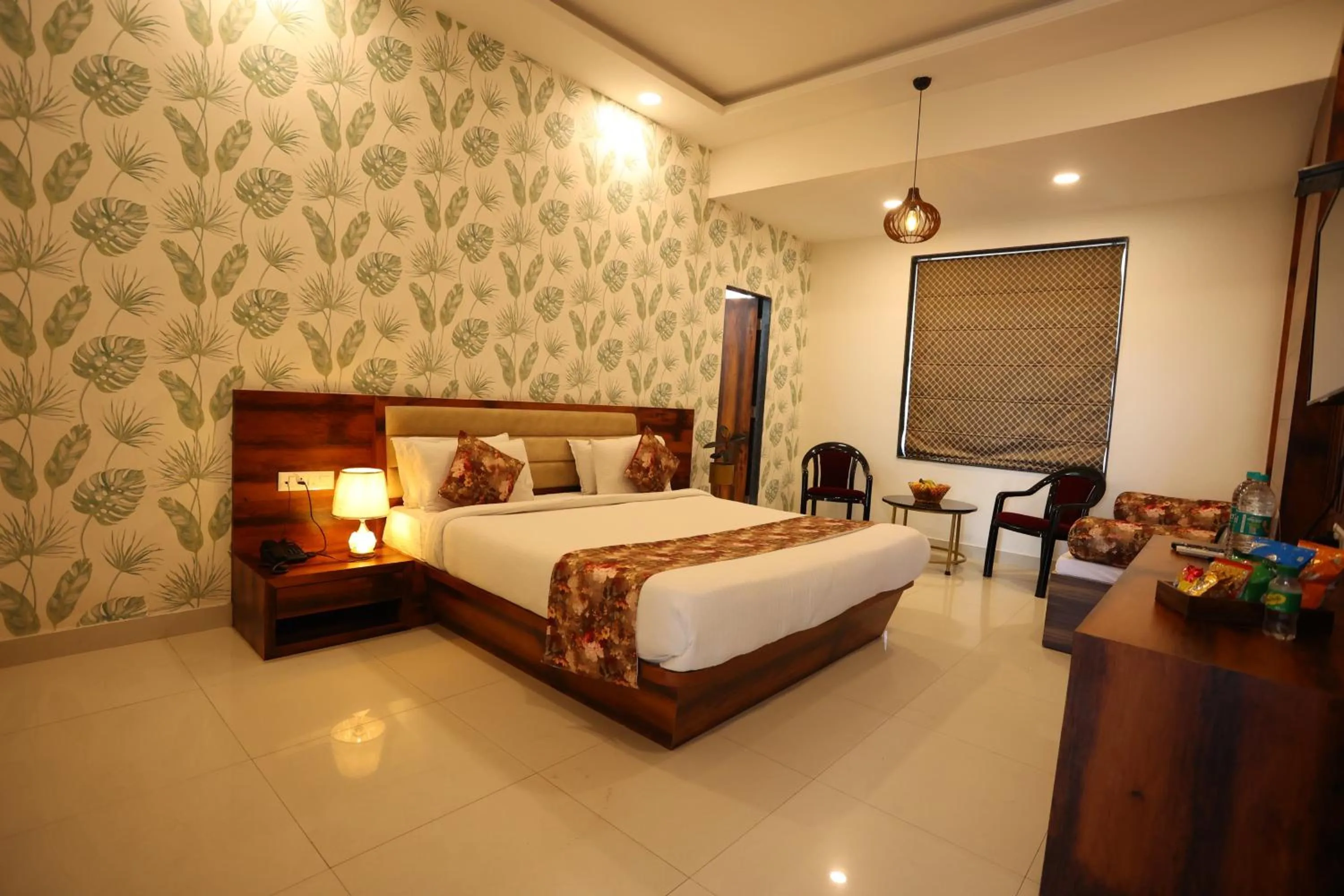 Bedroom, Bed in Hotel Bhairav Bagh with Swimming Pool