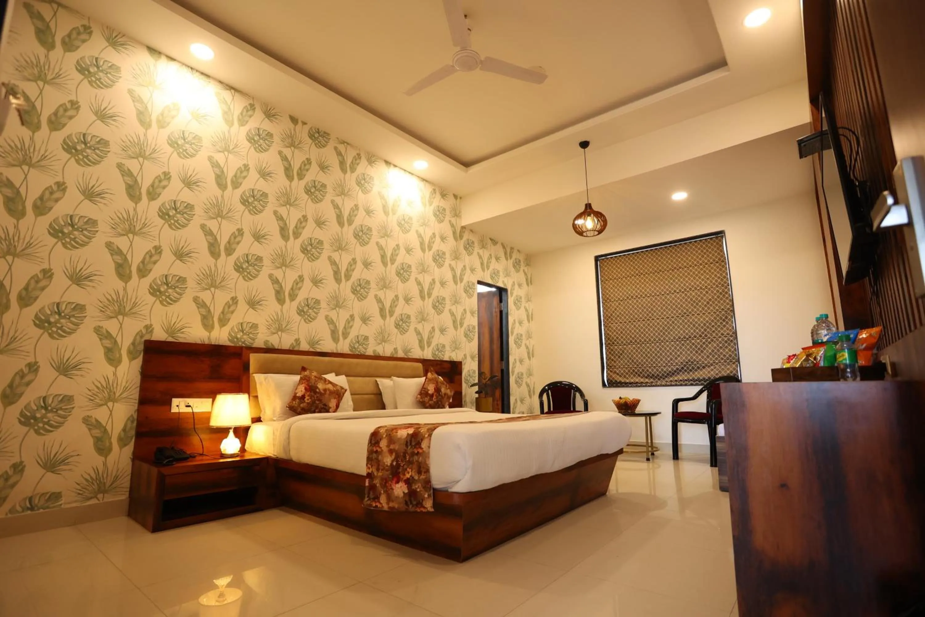 Bed in Hotel Bhairav Bagh with Swimming Pool