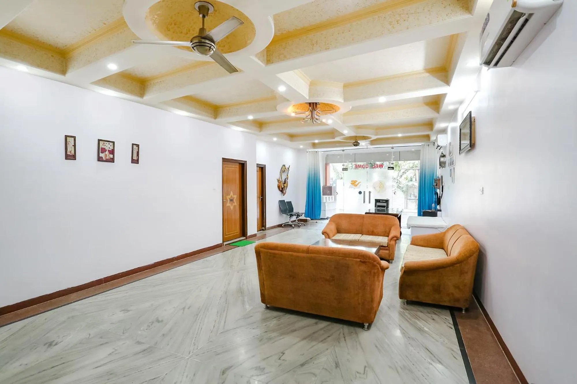 Seating area in FabHotel Premium Rooms - Nr Yashobhoomi Convention Centre