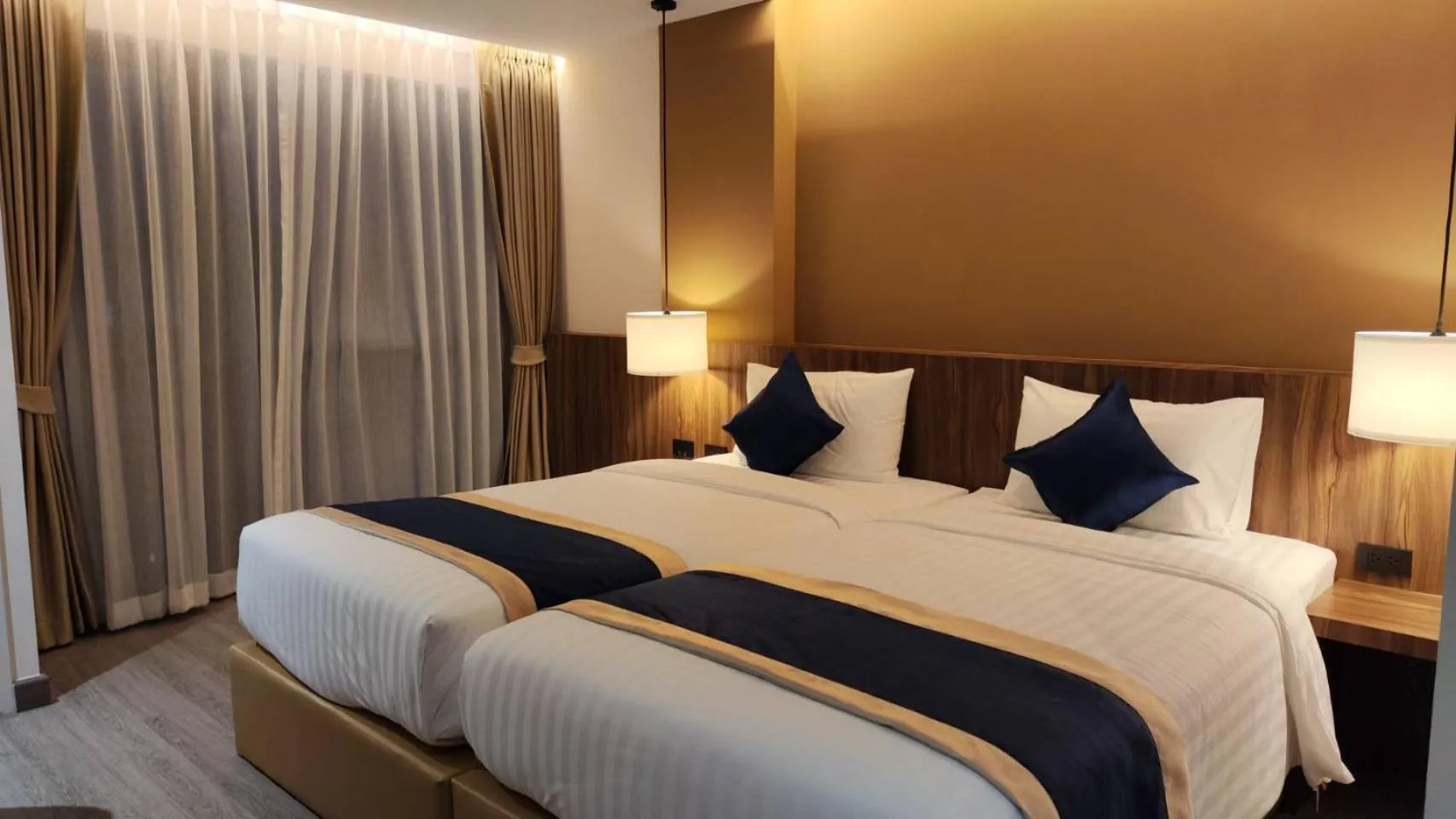 Bed in Hi Chiangmai Hotel