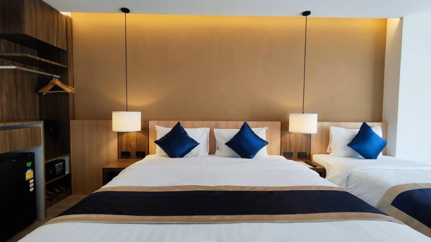 Bed in Hi Chiangmai Hotel