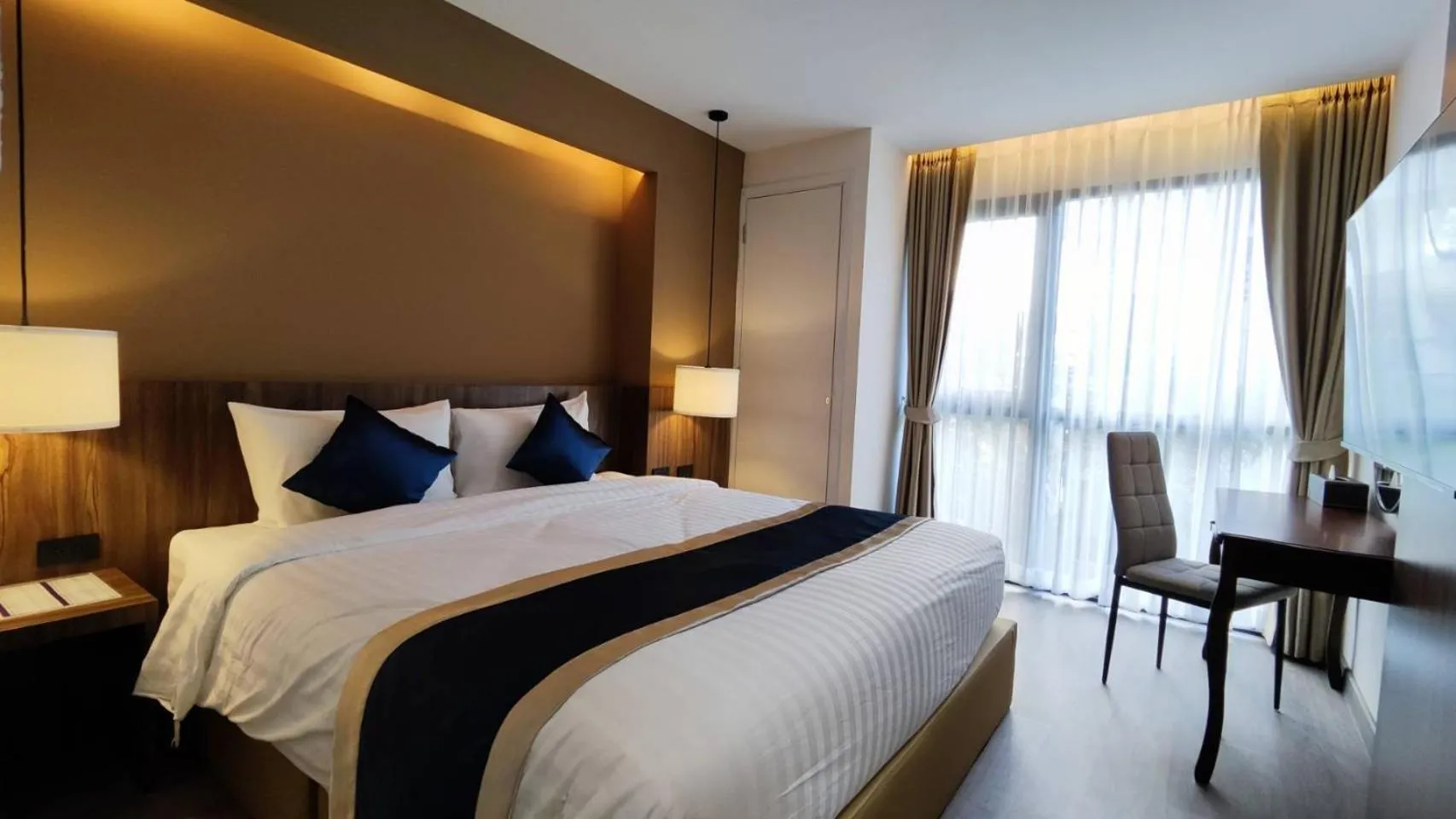 Bed in Hi Chiangmai Hotel