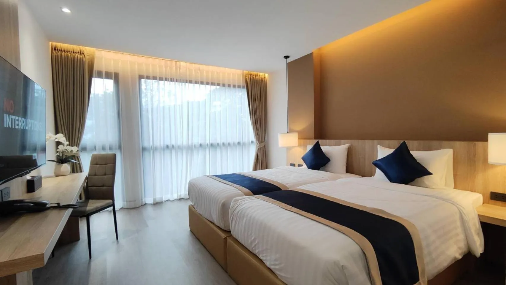 Bed in Hi Chiangmai Hotel