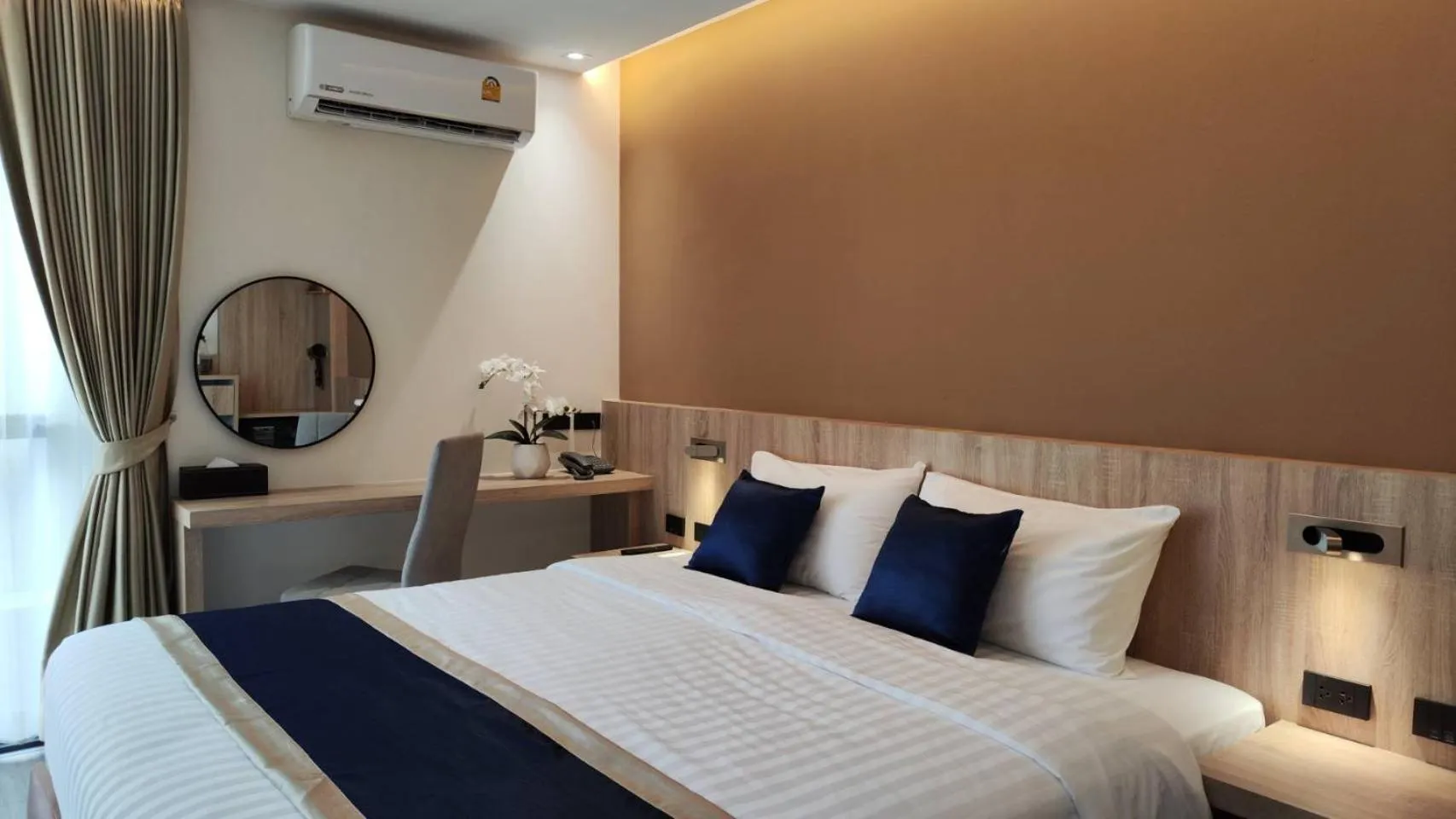 Bed in Hi Chiangmai Hotel