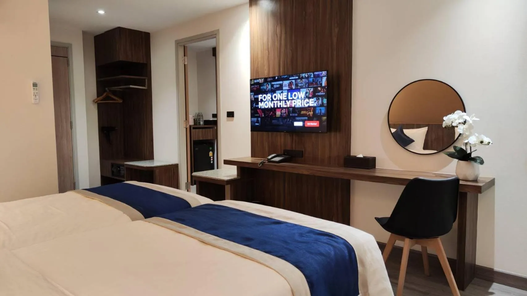 Bed in Hi Chiangmai Hotel