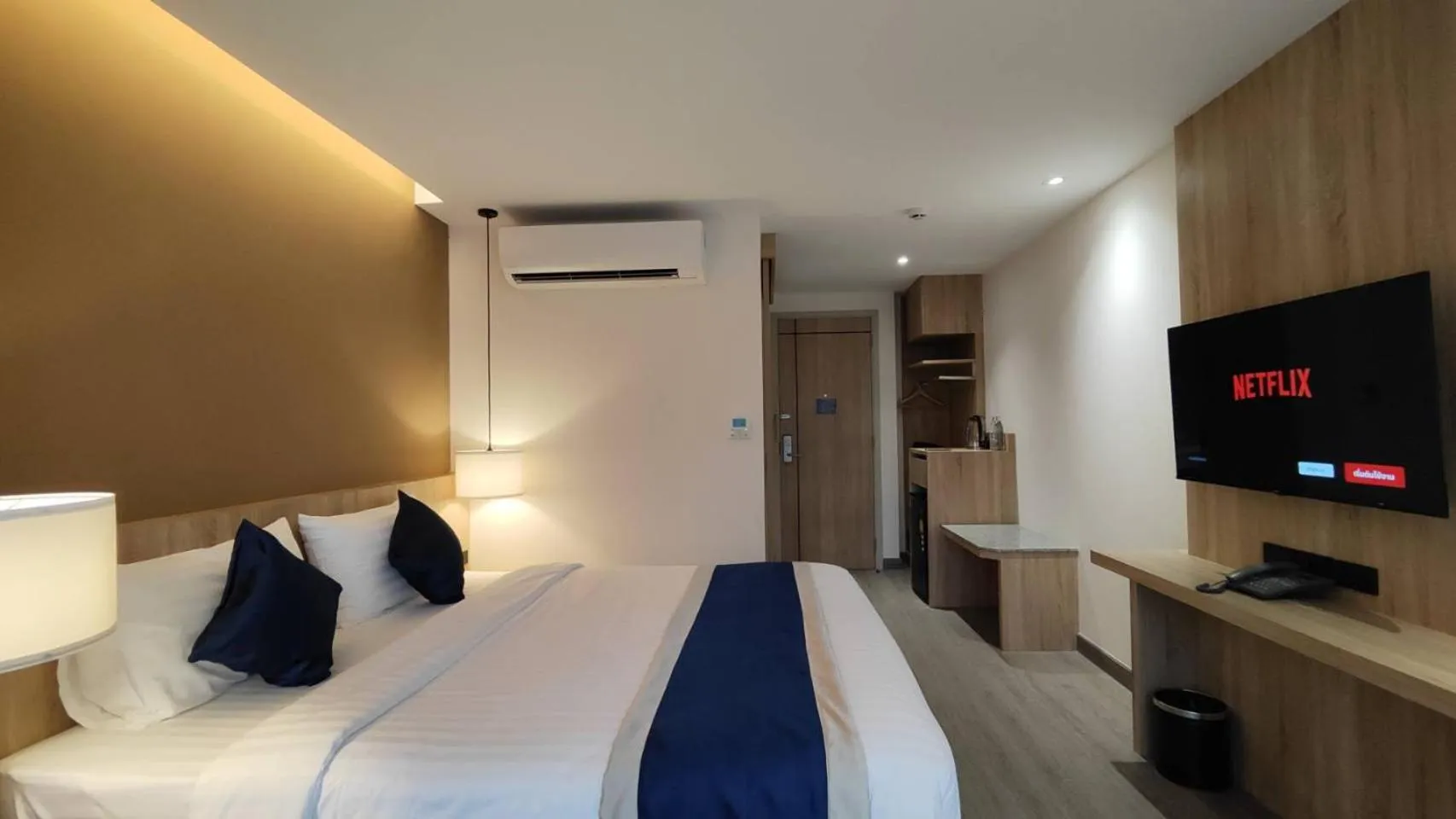 Bed in Hi Chiangmai Hotel