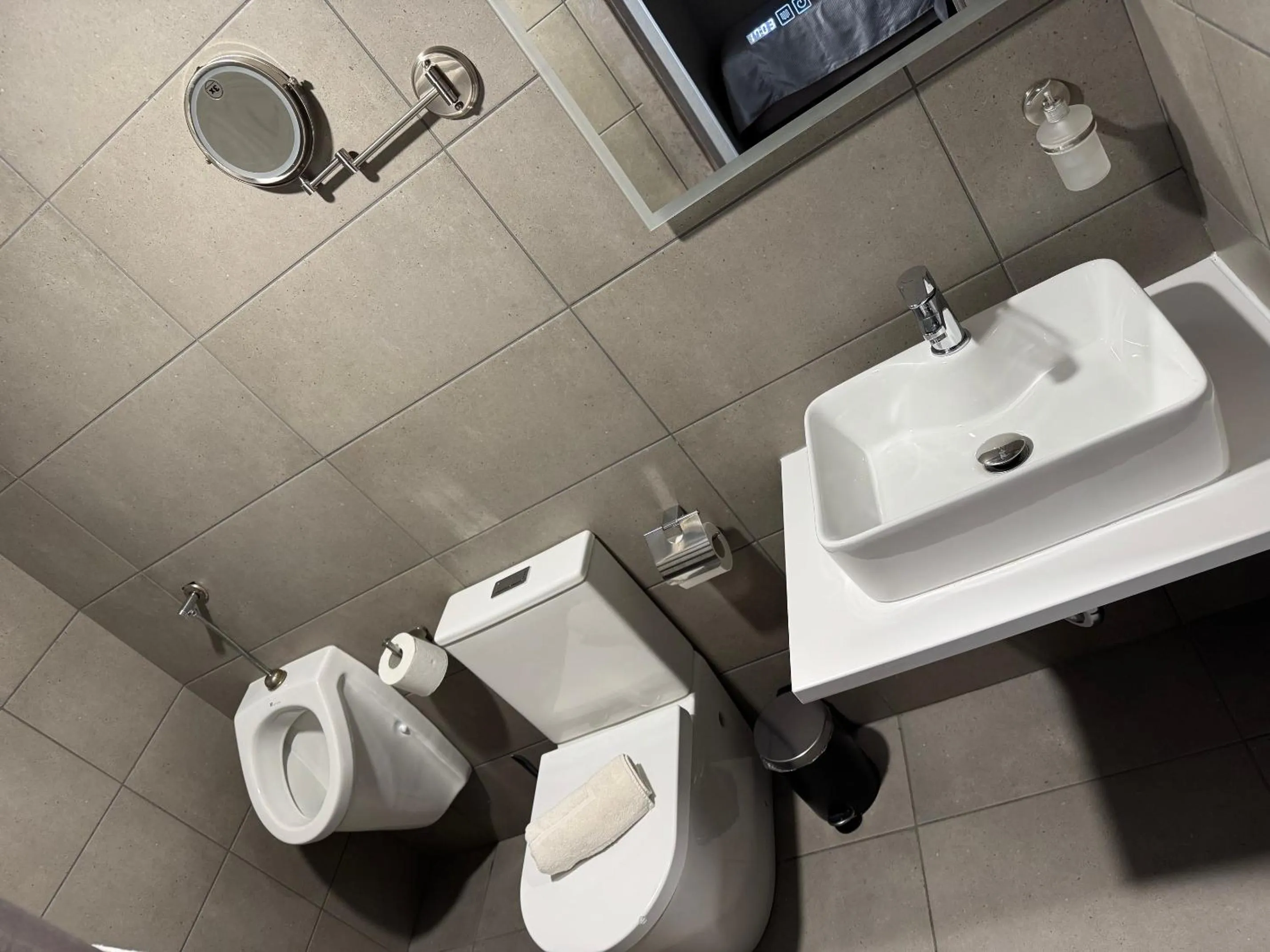 Bathroom in Arena Deluxe & Spa