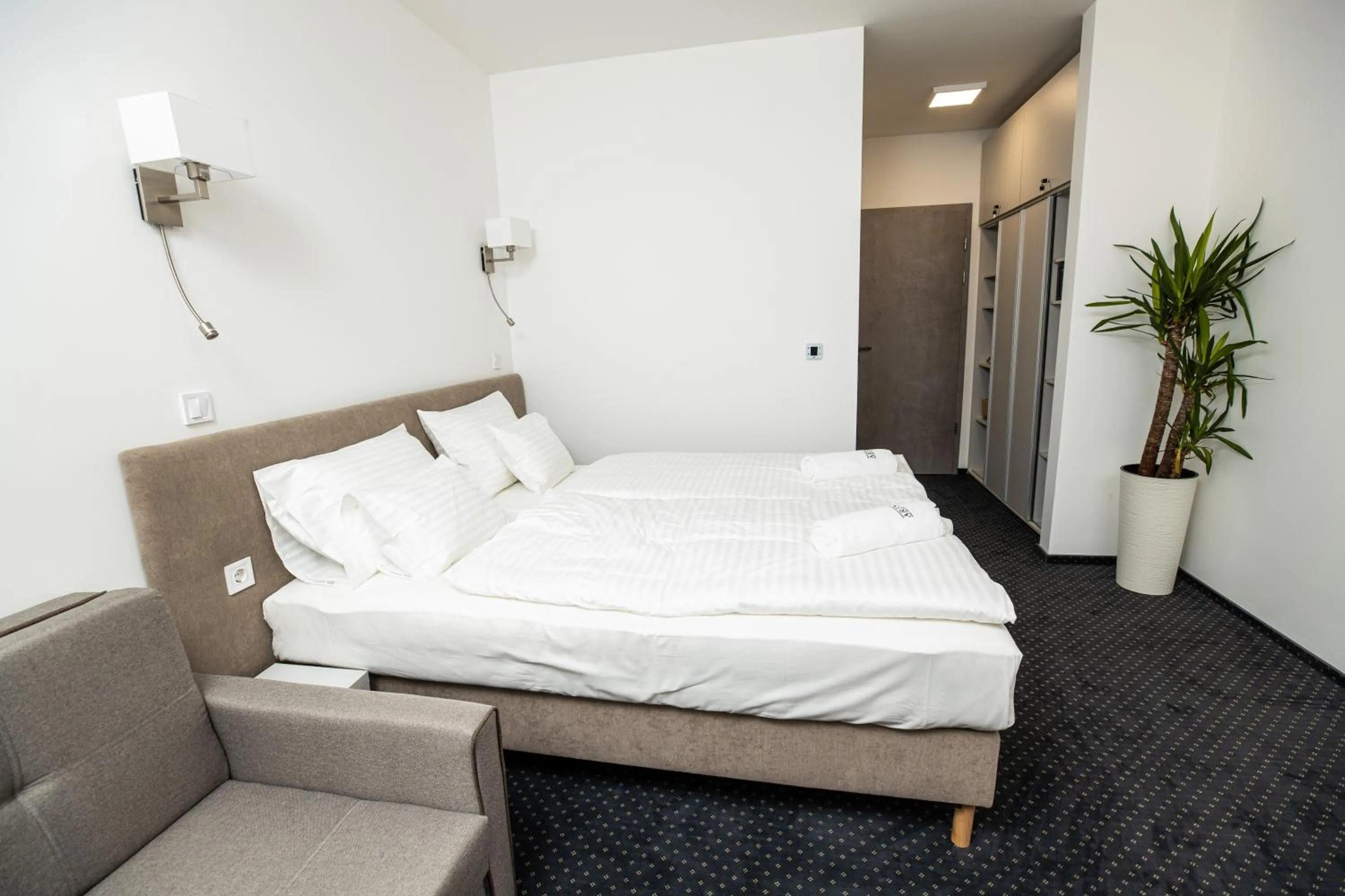 Bed in Arena Deluxe & Spa