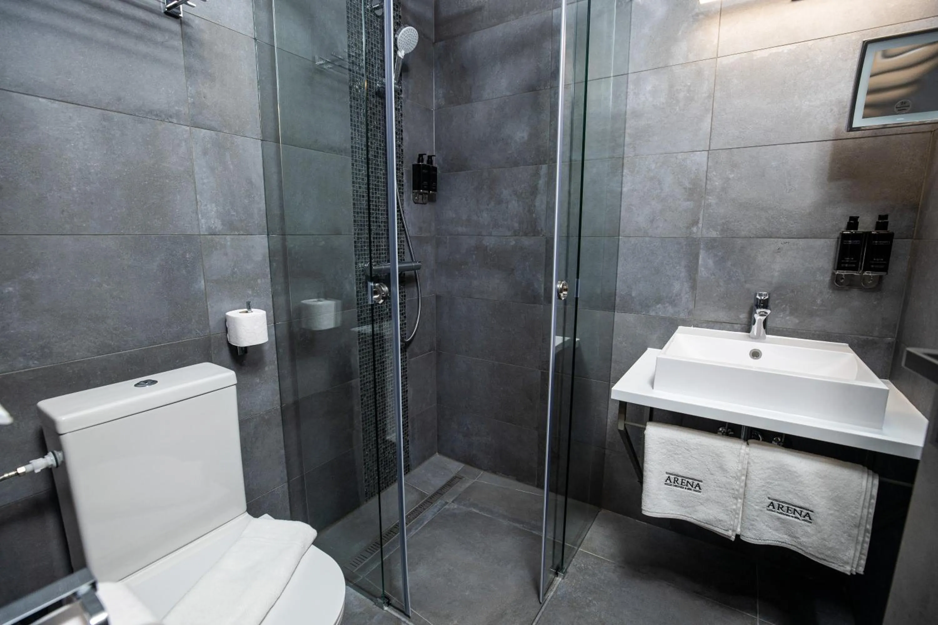 Bathroom in Arena Deluxe & Spa