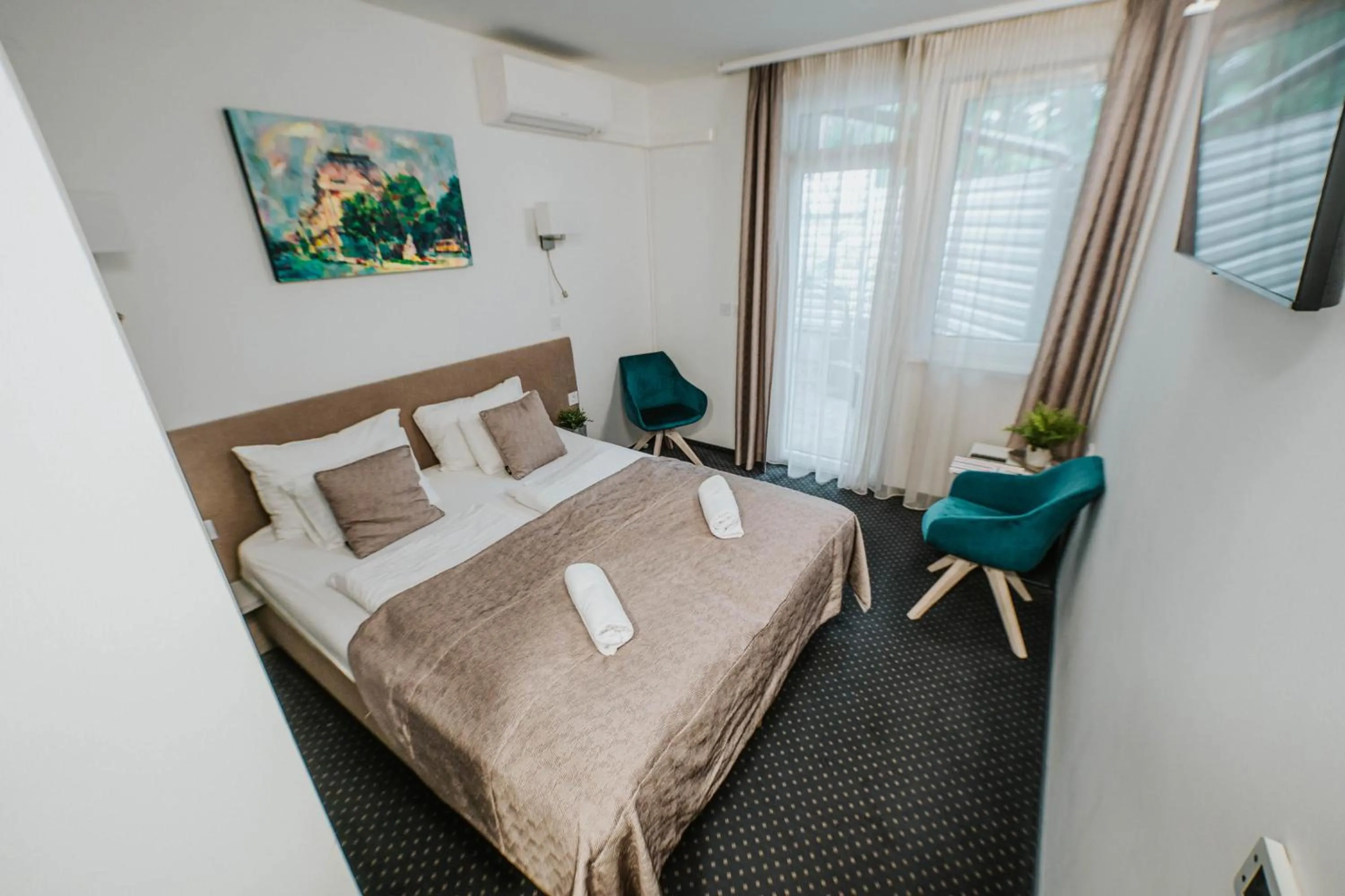 Bed in Arena Deluxe & Spa