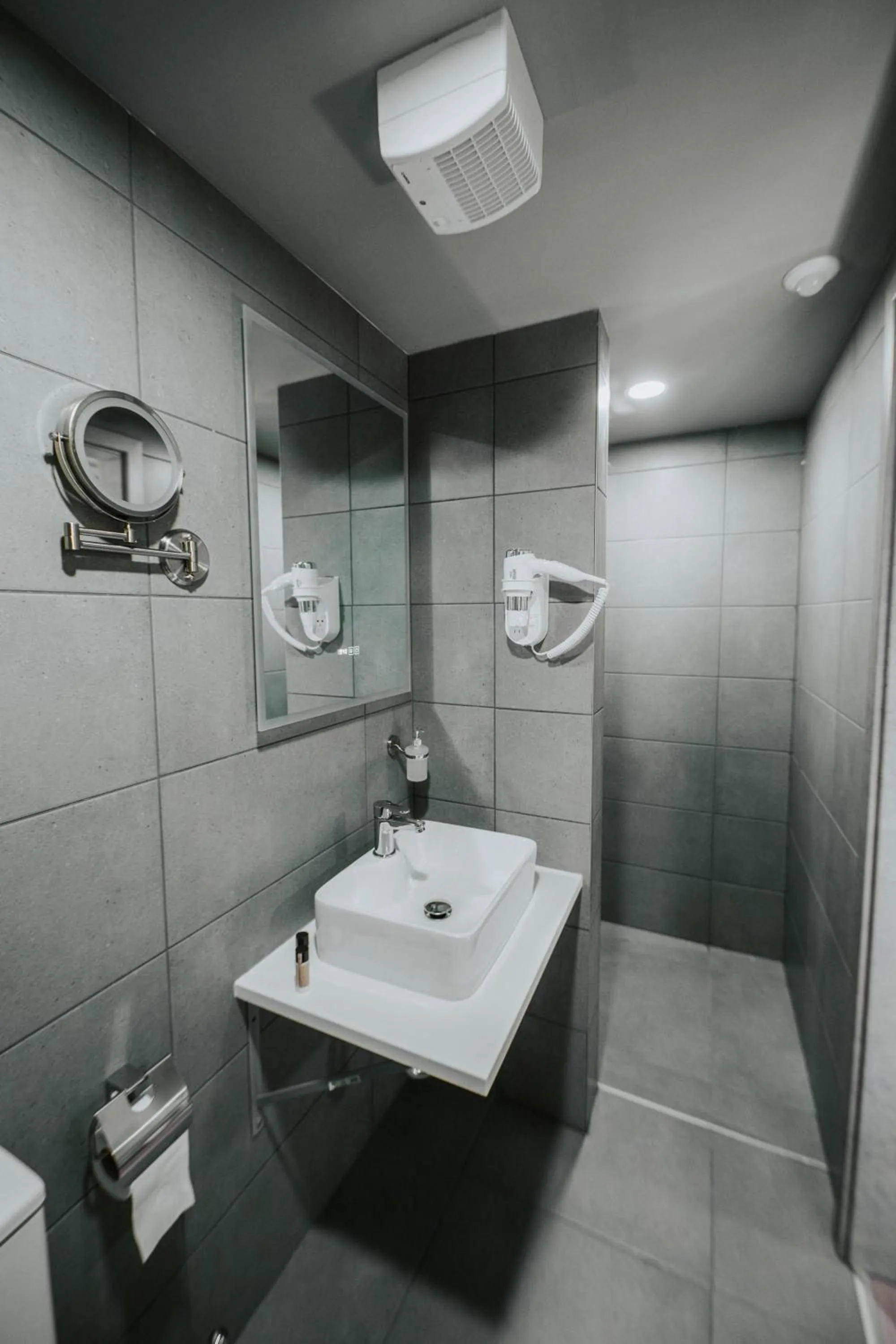 Bathroom in Arena Deluxe & Spa