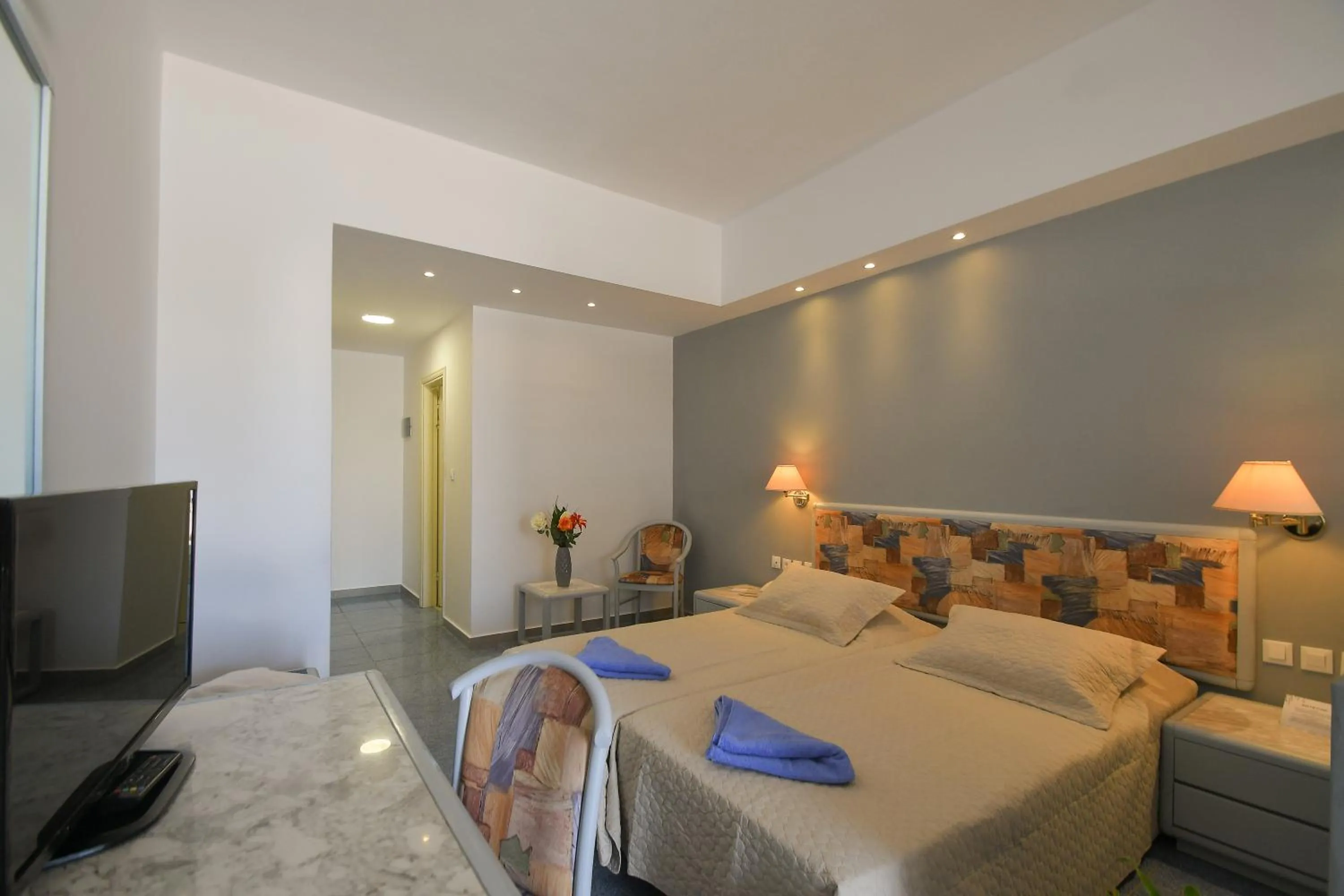 Bed in OLYMPOS BEACH HOTEL