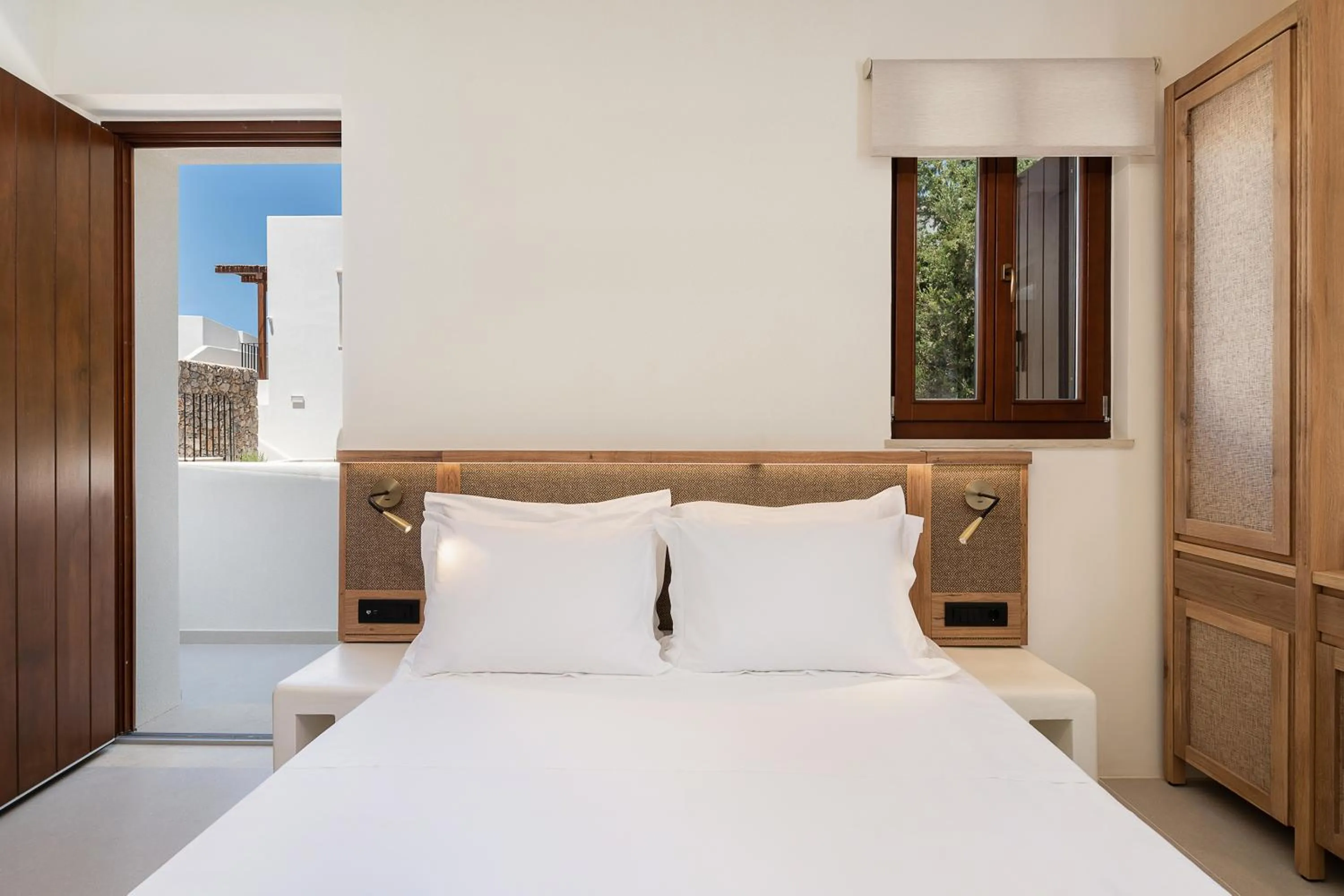 Bed in The Authentic Village Boutique Hotel