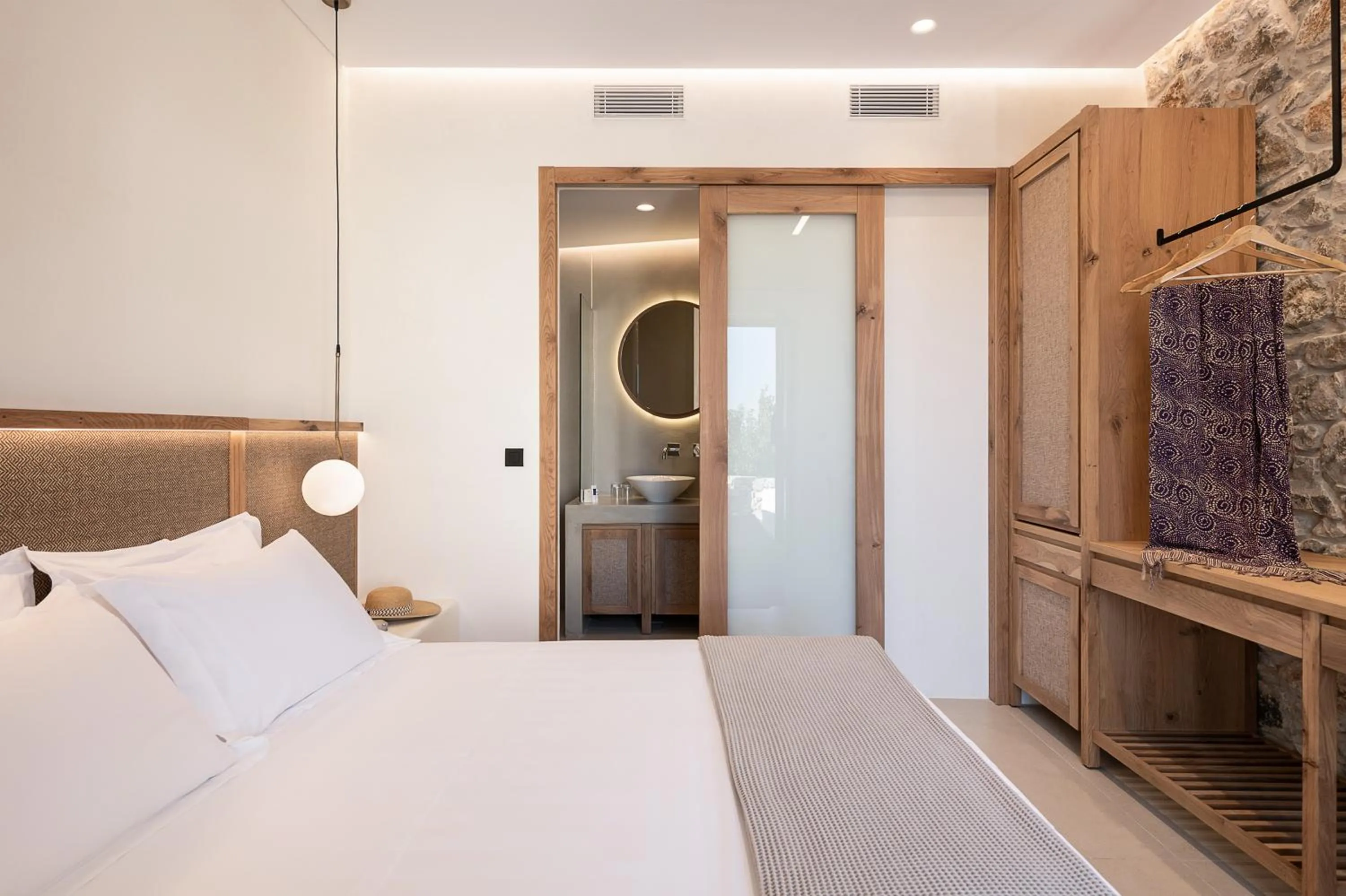 Bed in The Authentic Village Boutique Hotel