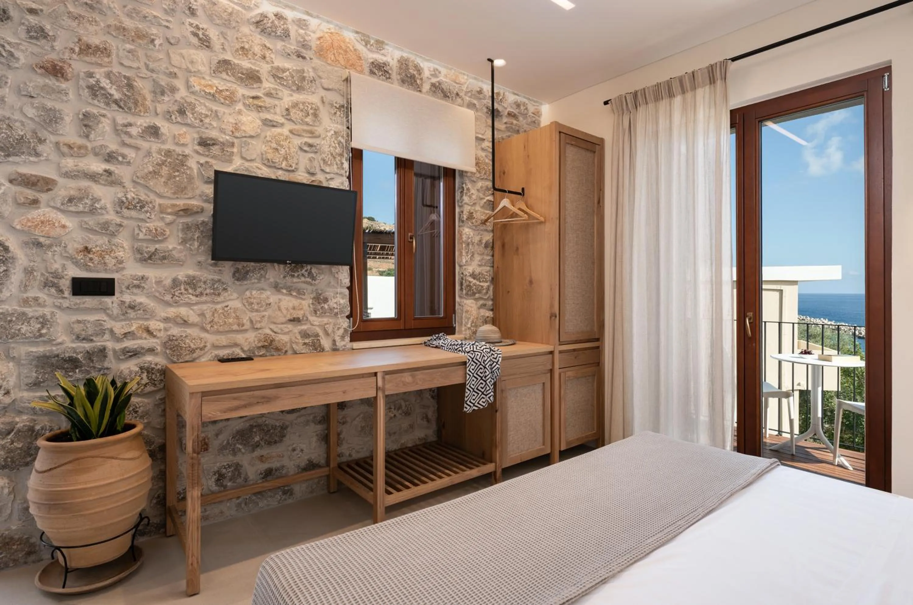 Communal lounge/ TV room, Bed in The Authentic Village Boutique Hotel