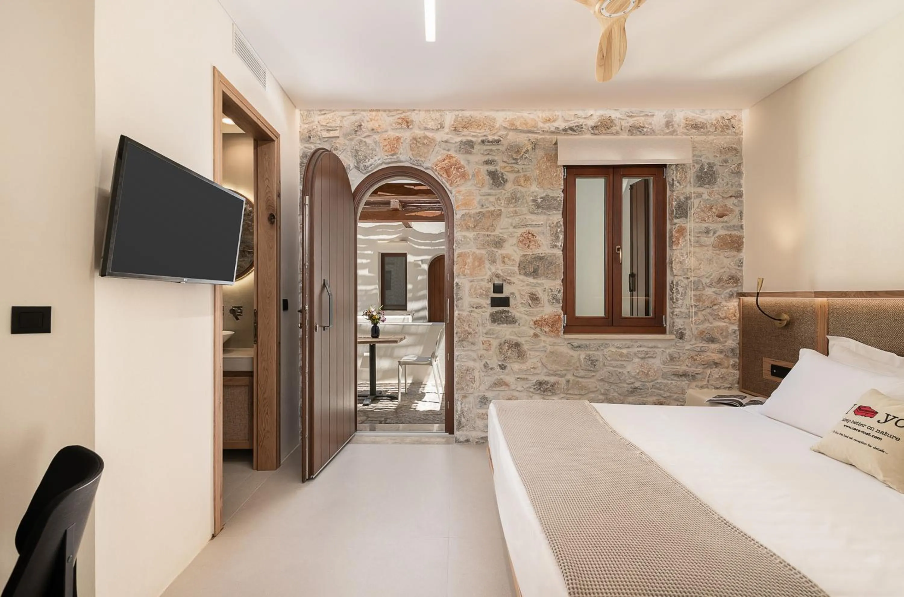 Bed in The Authentic Village Boutique Hotel