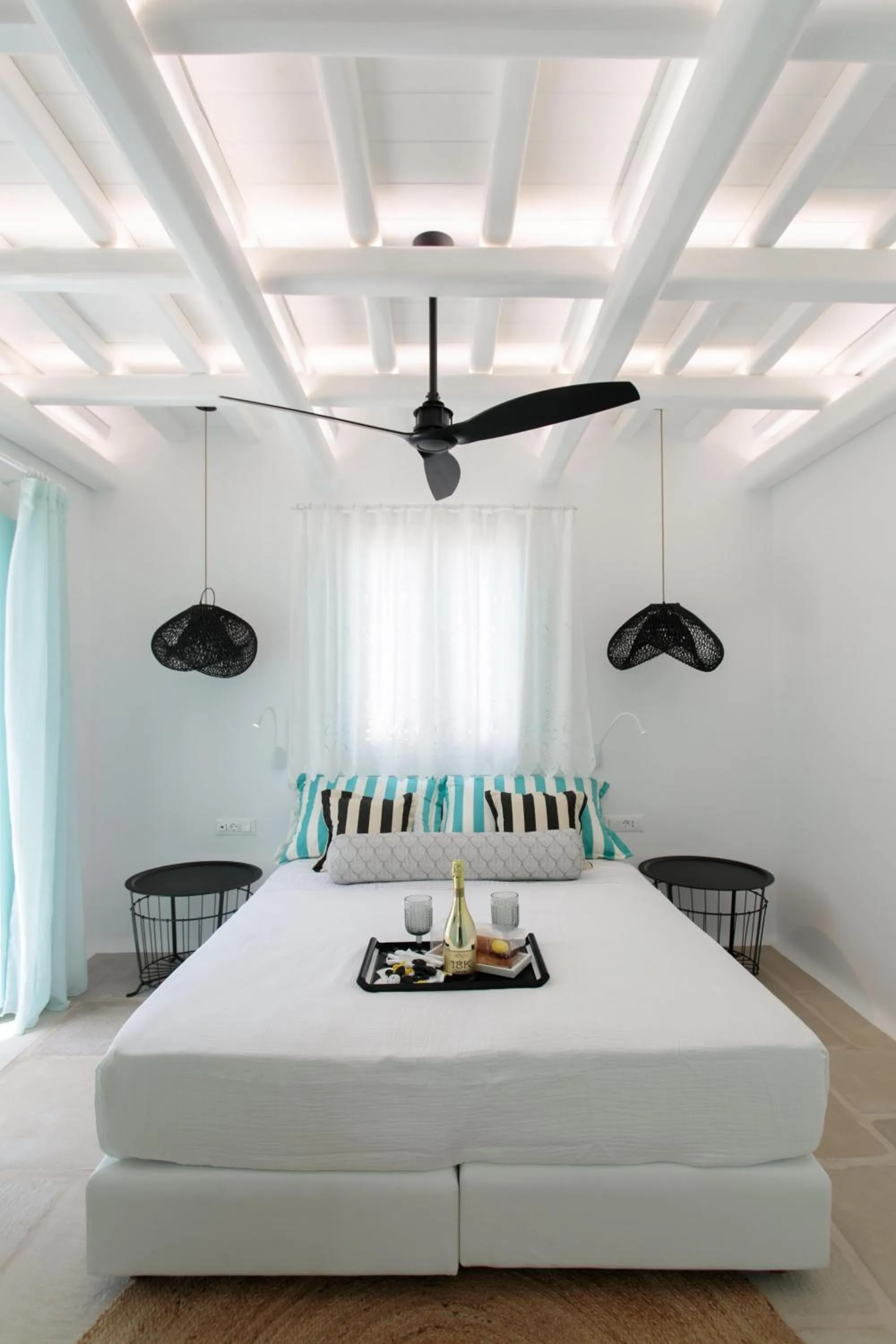 Bed in Majo Suites Hotel