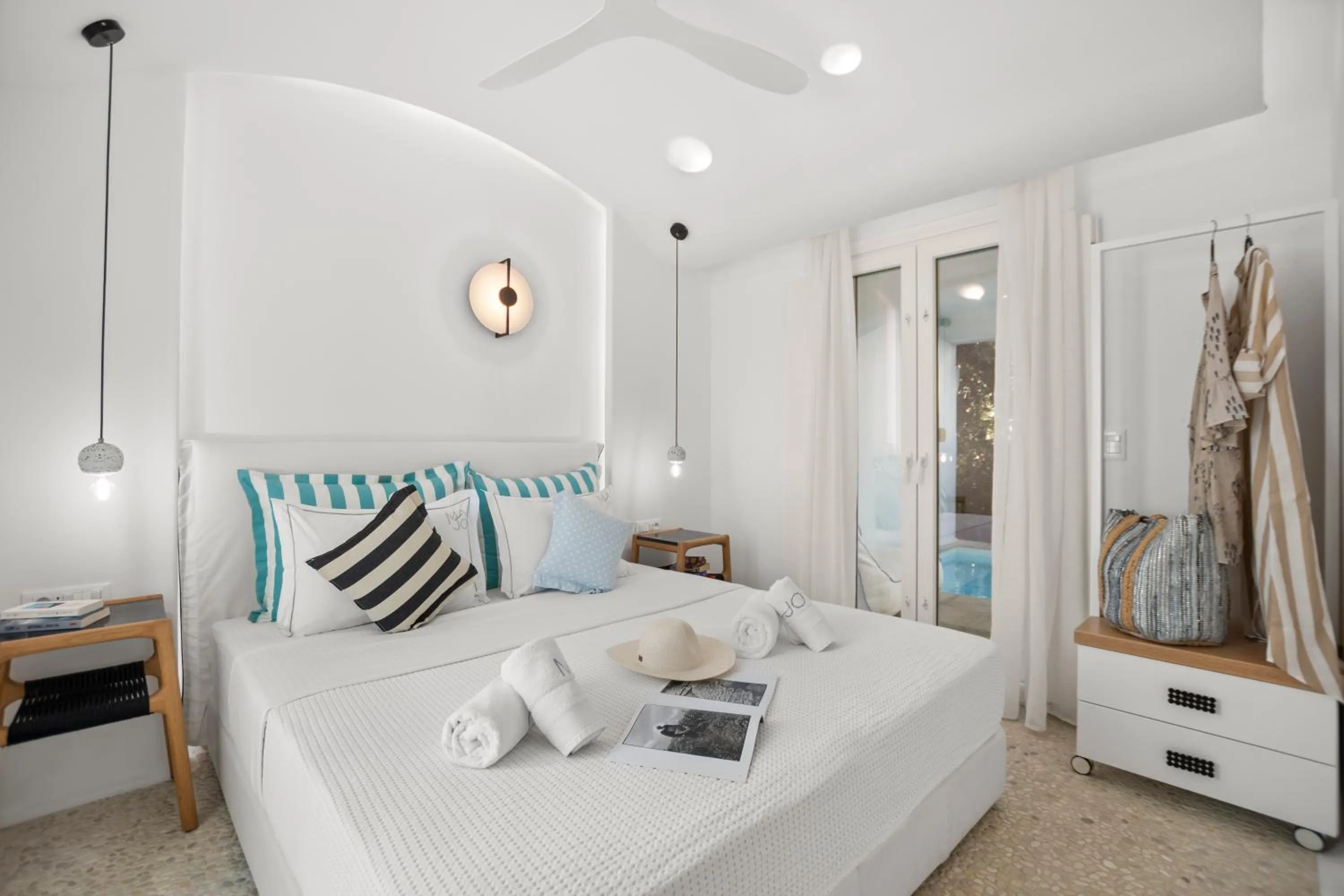 Patio, Bed in Majo Suites Hotel