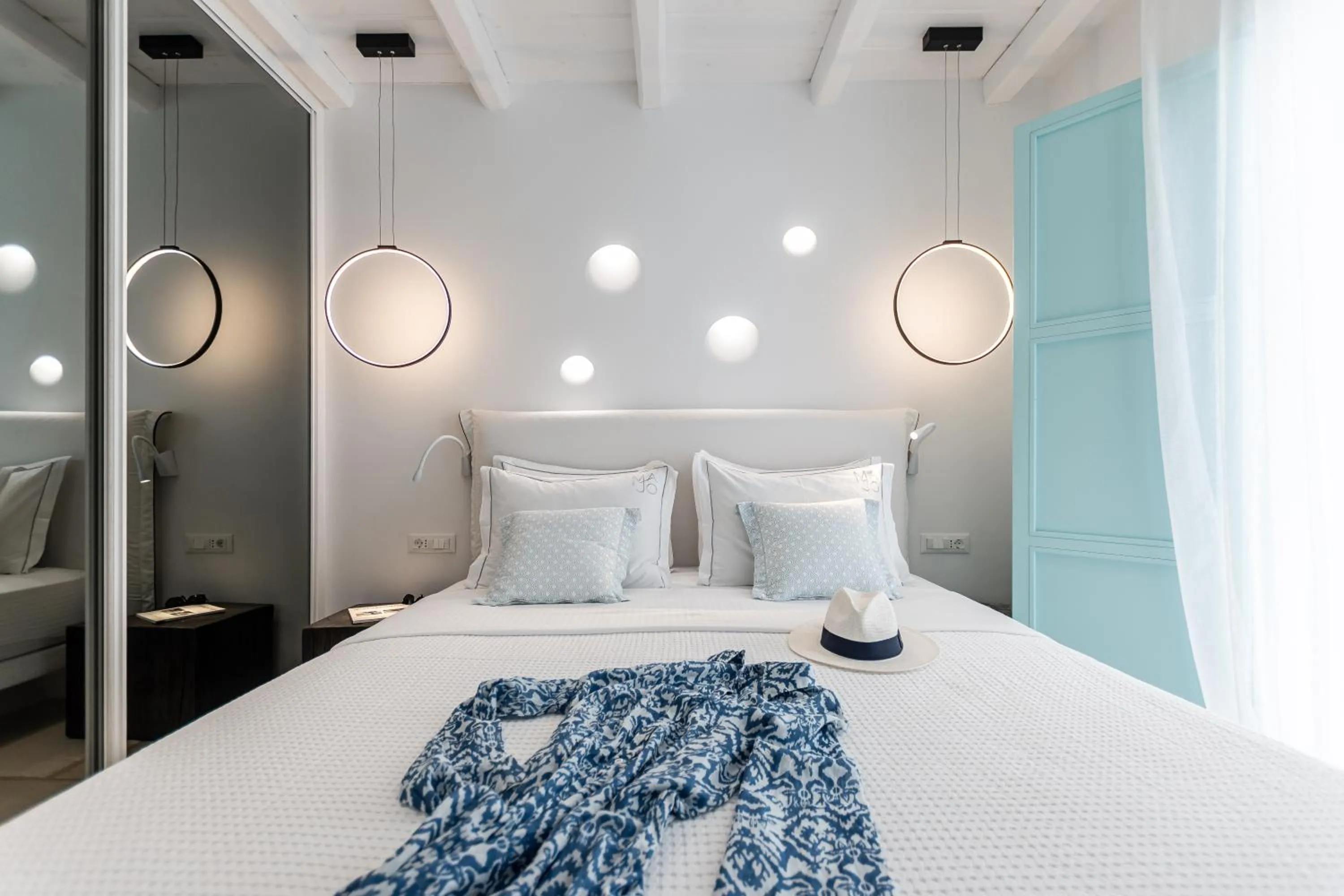 Patio, Bed in Majo Suites Hotel