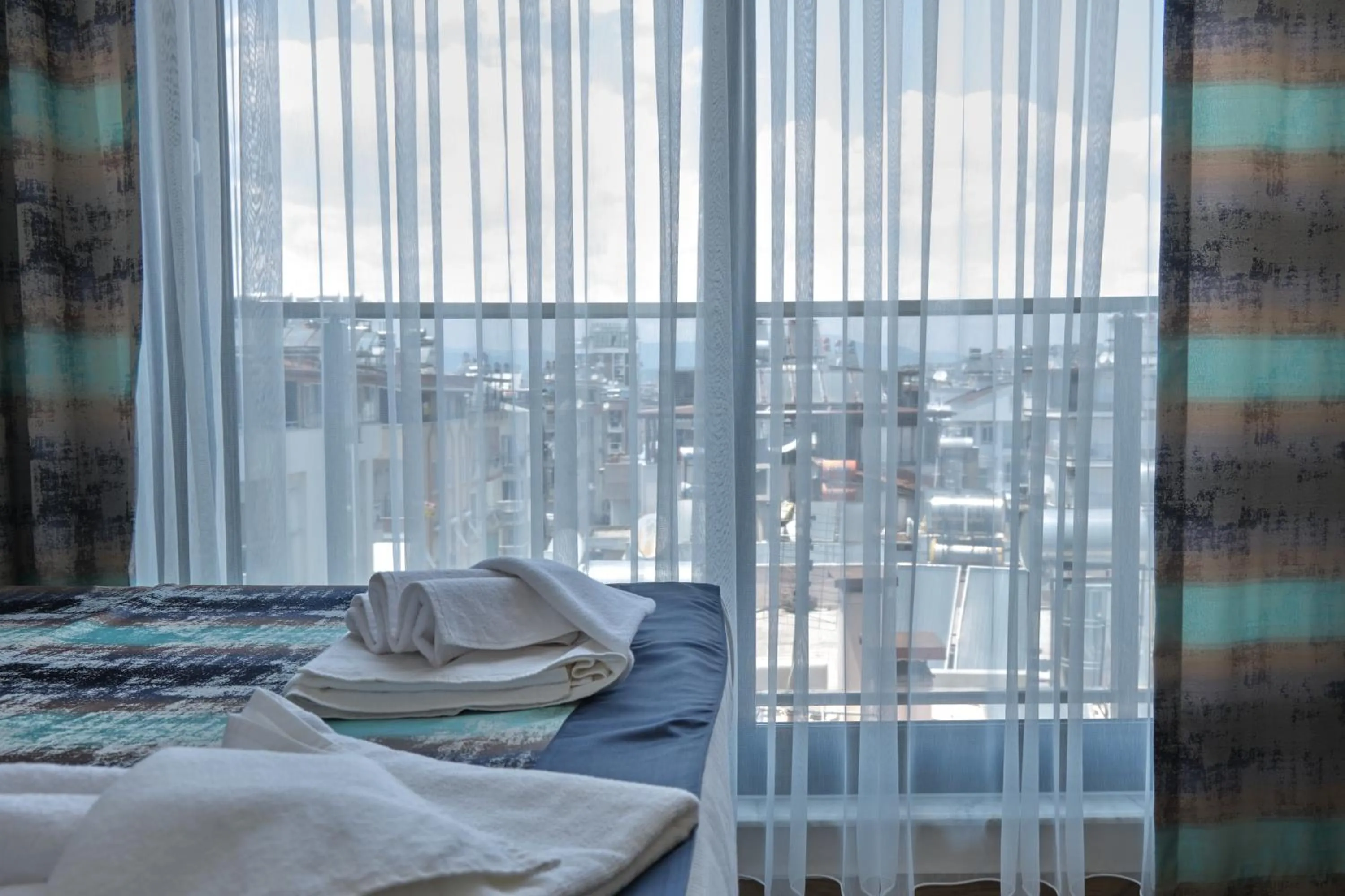 Bed in KALİSPERA HOTEL