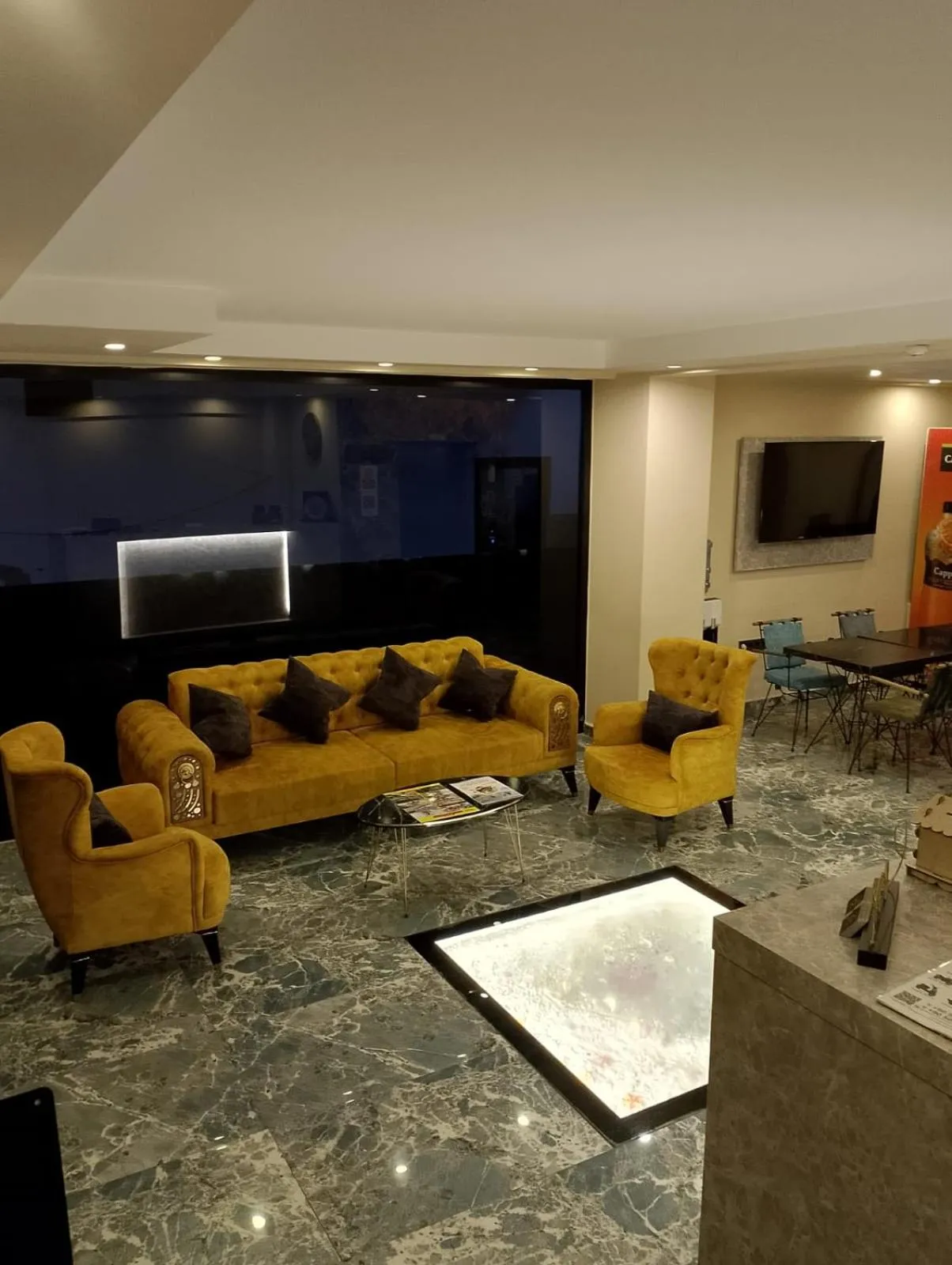 Communal lounge/ TV room in KALİSPERA HOTEL