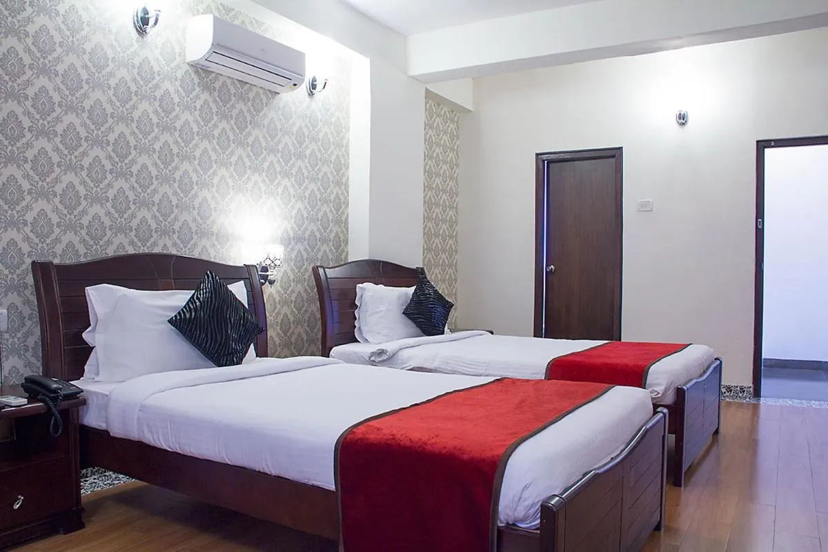 Bed in Orchid Suites - A Boutique Hotel Bangalore Off Residency Road