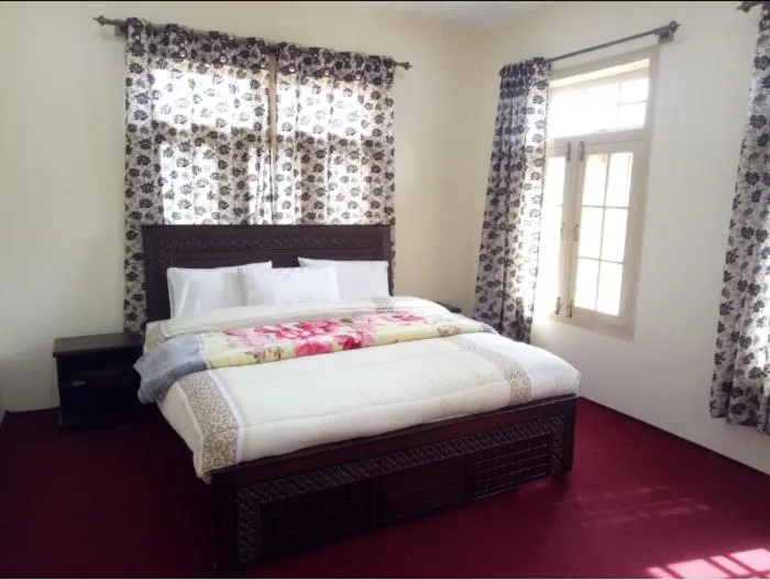 Bed in Hunza Regency Inn