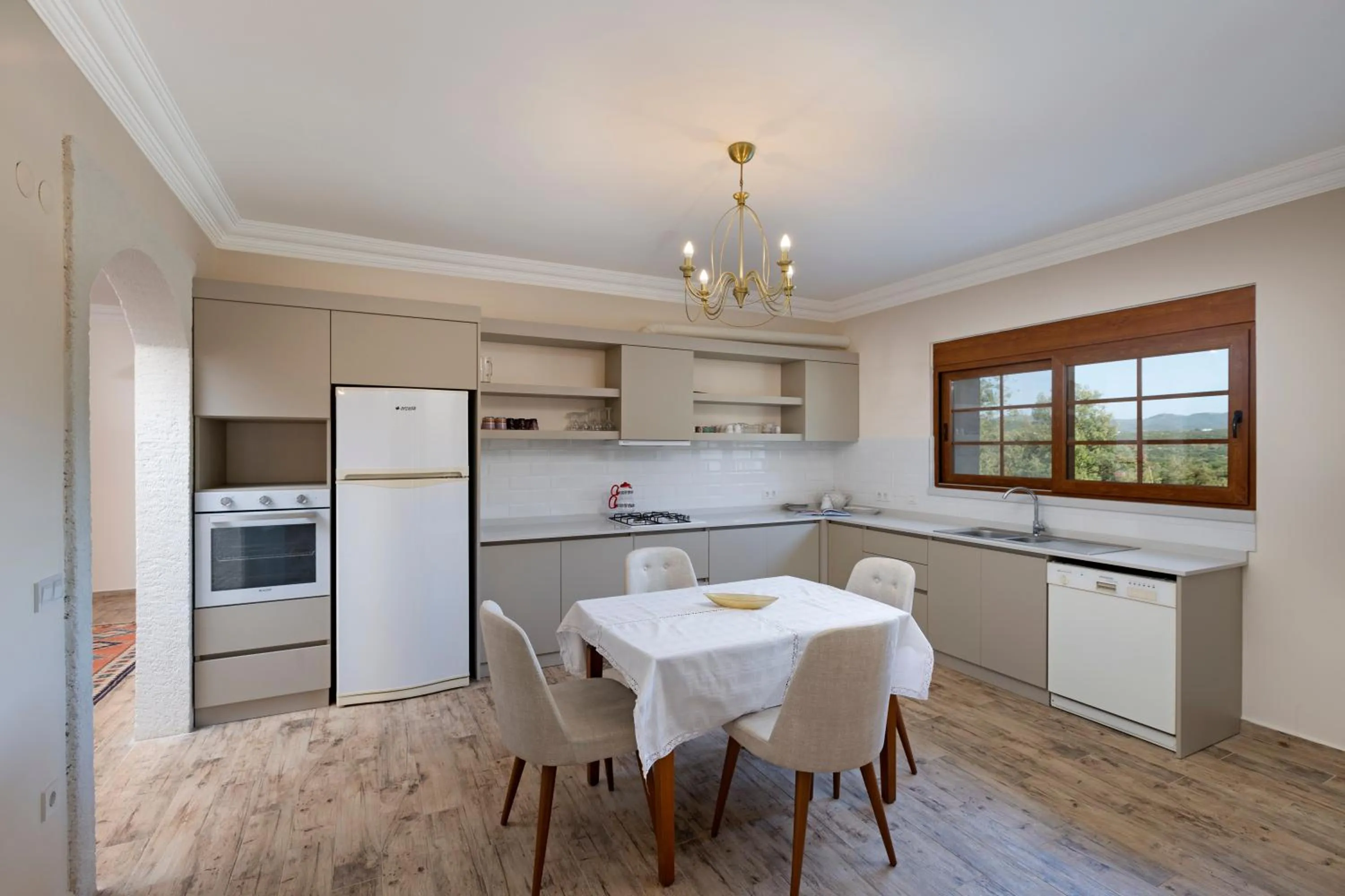 Kitchen or kitchenette in Kairos Hotel