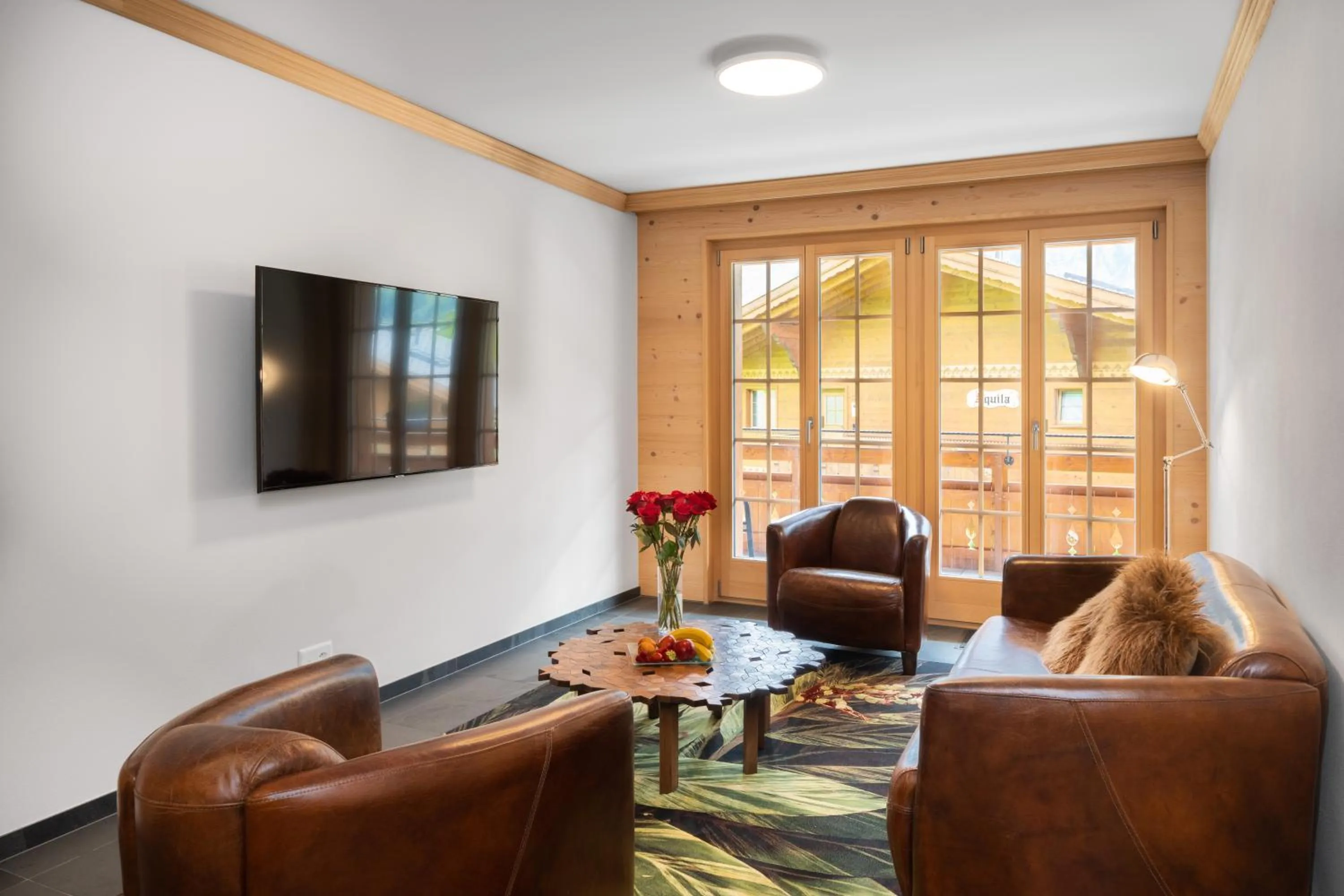 Communal lounge/ TV room in Chalet Alia and Apartments-Grindelwald by Swiss Hotel Apartments