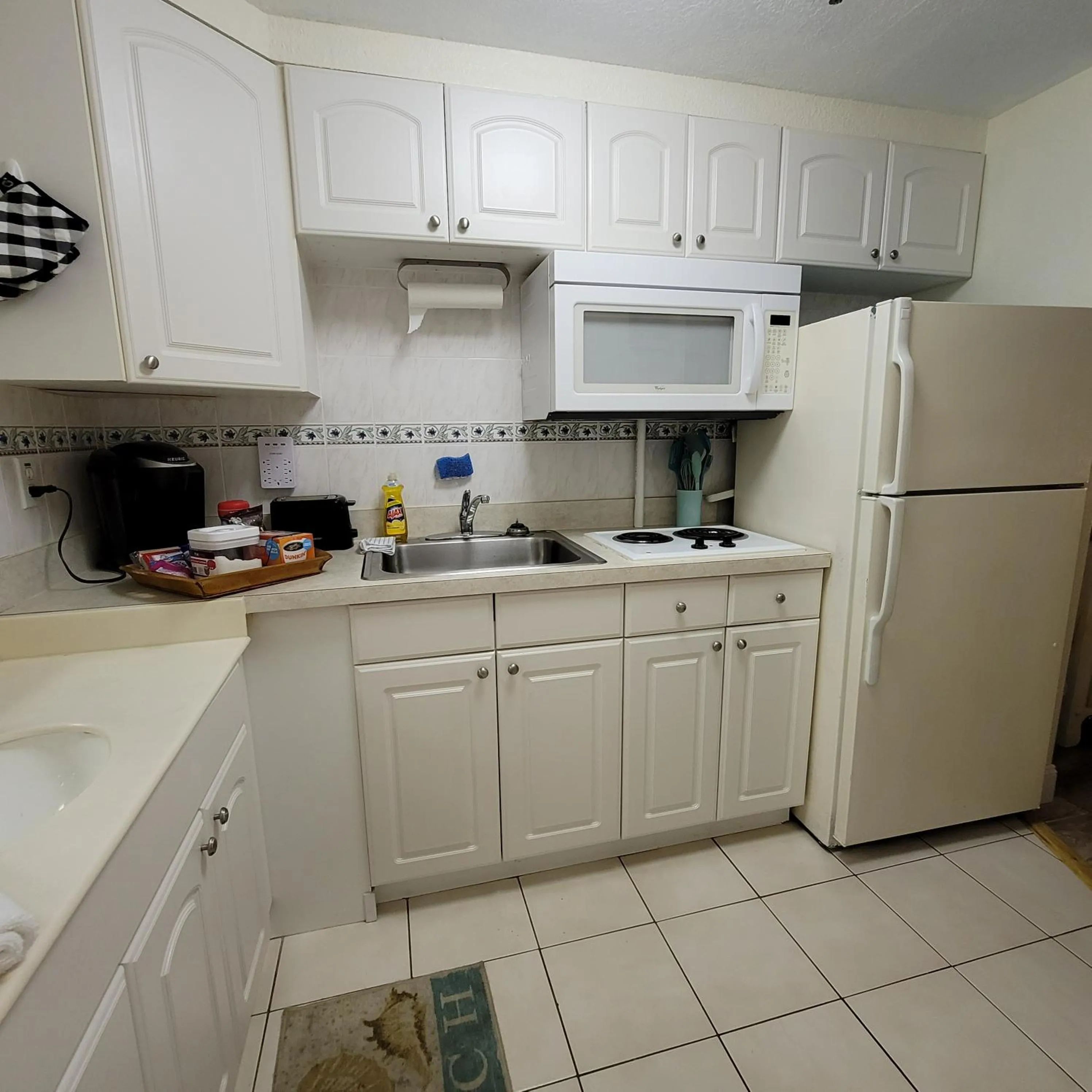 Kitchen or kitchenette in Stay ON the beach! Wonderful location!