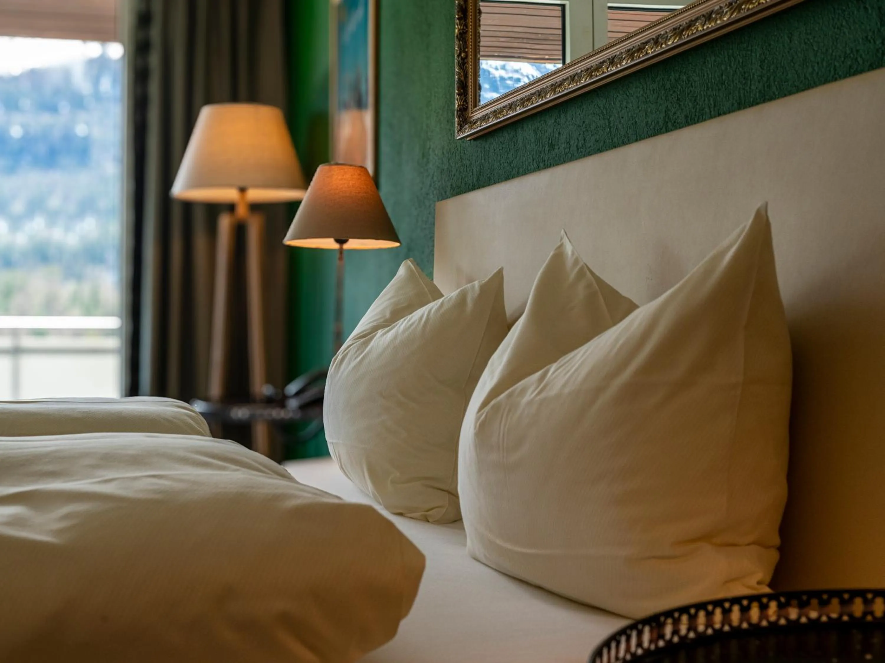 Bed in Hotel Europa Suites St Moritz