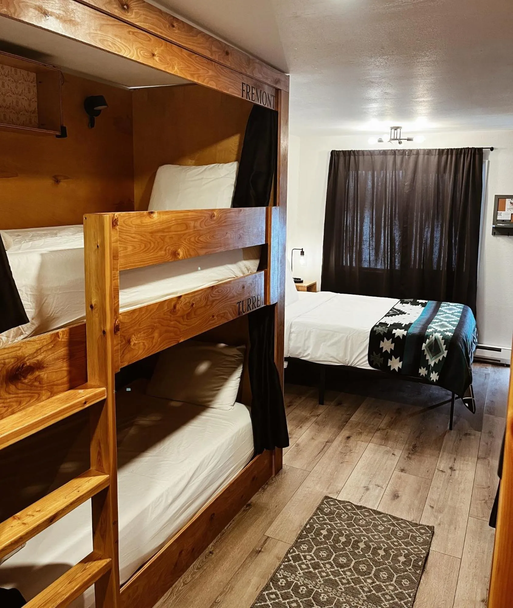 Bed in Jackalope Motor Lodge