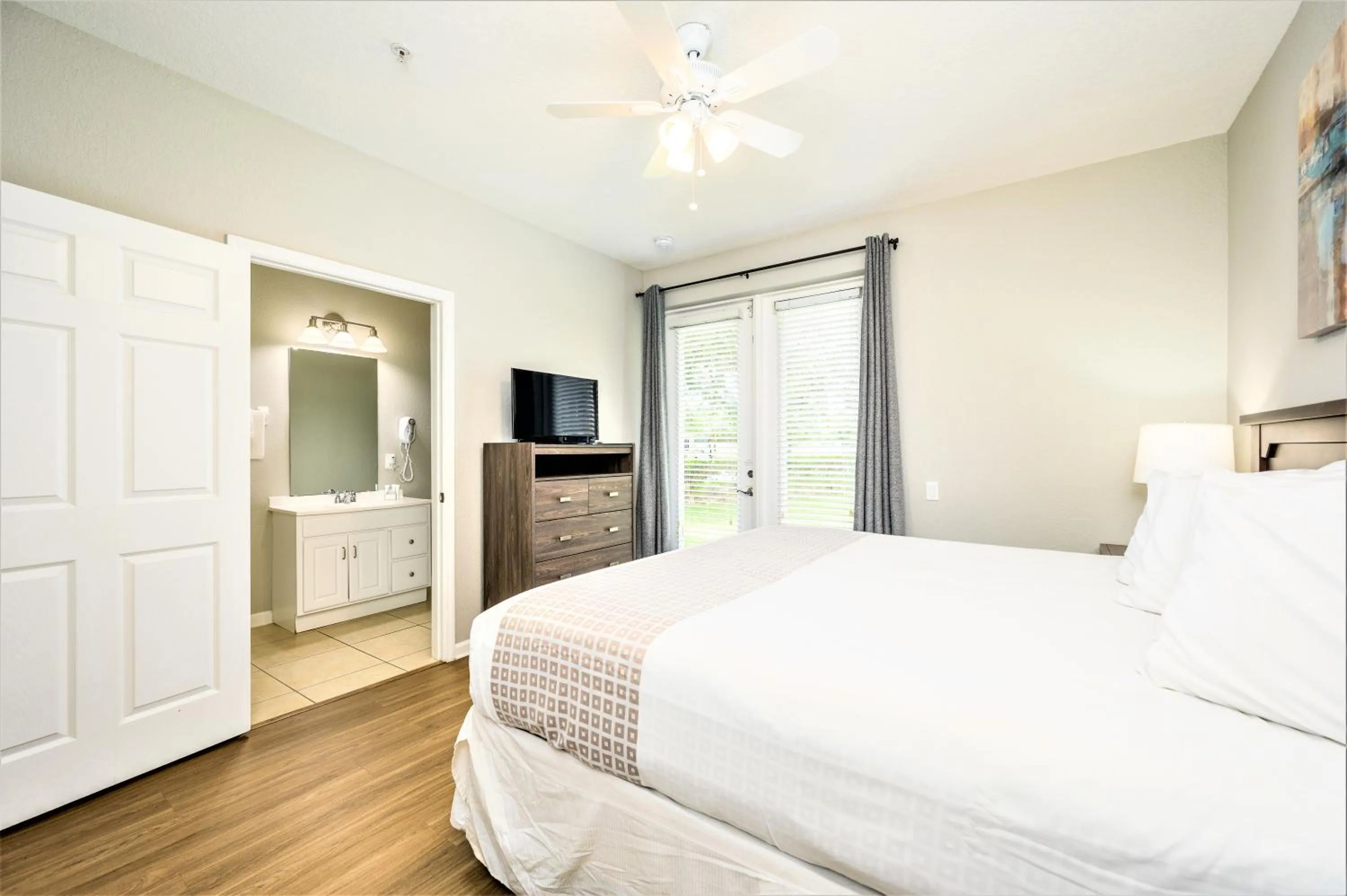 Bedroom, Bed in Vista Cay Resort by Millenium at Universal Blvd.