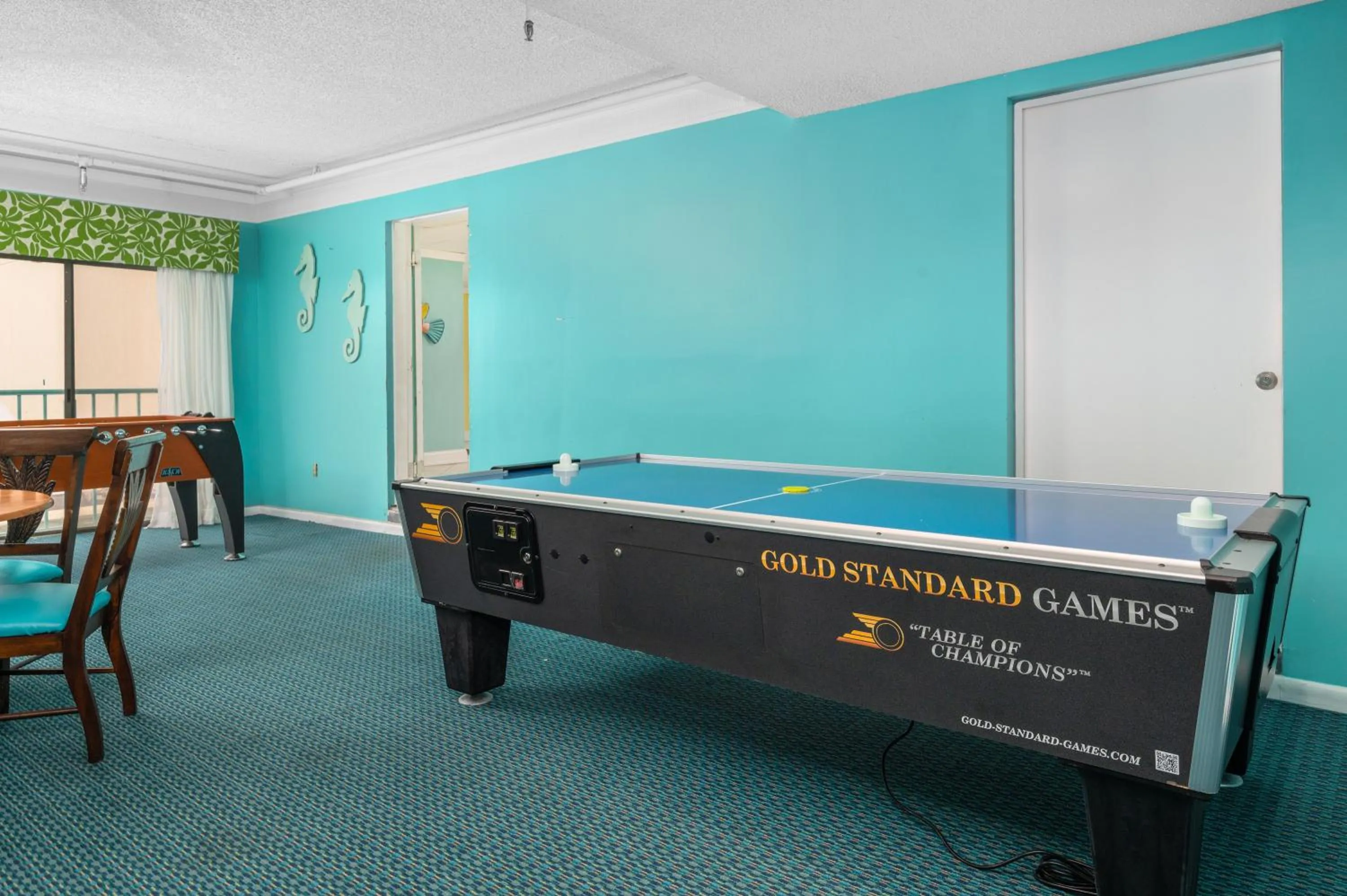 Game Room in Cayman Suites Hotel
