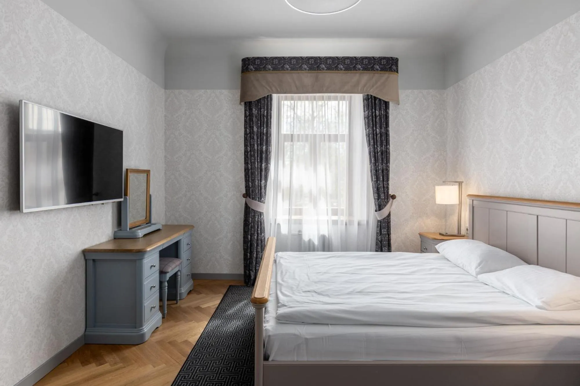 Bed in Roze Republikas Apartments