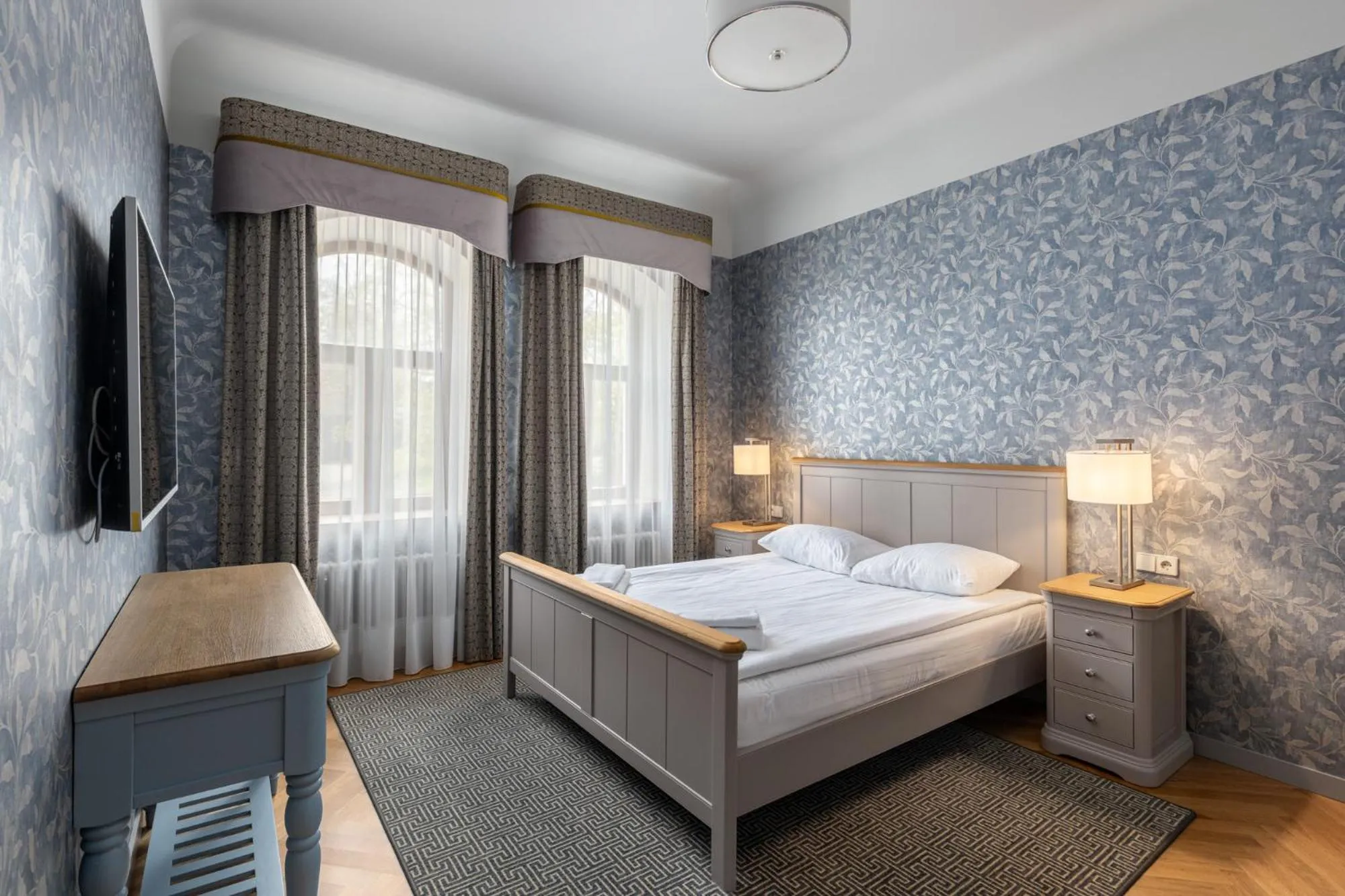 Bed in Roze Republikas Apartments