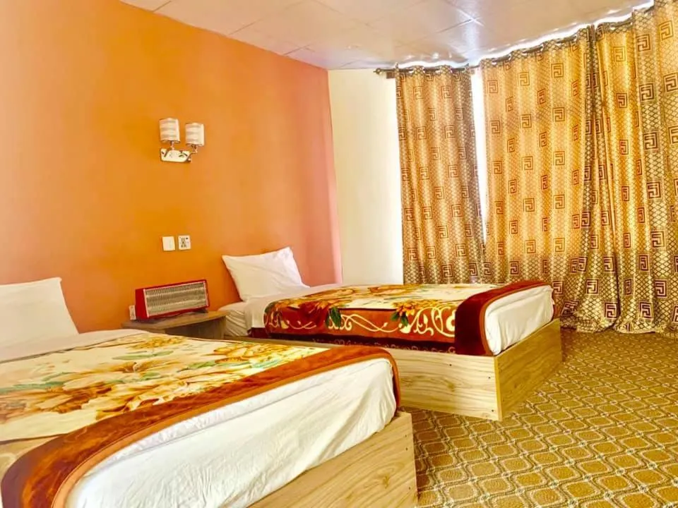 Bed in Hunza Panorama Hotel