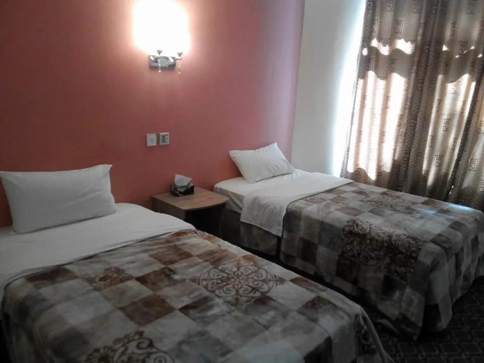 Bed in Hunza Panorama Hotel