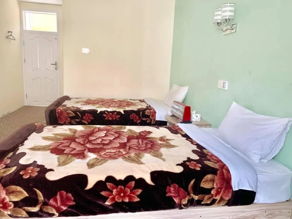Bed in Hunza Panorama Hotel