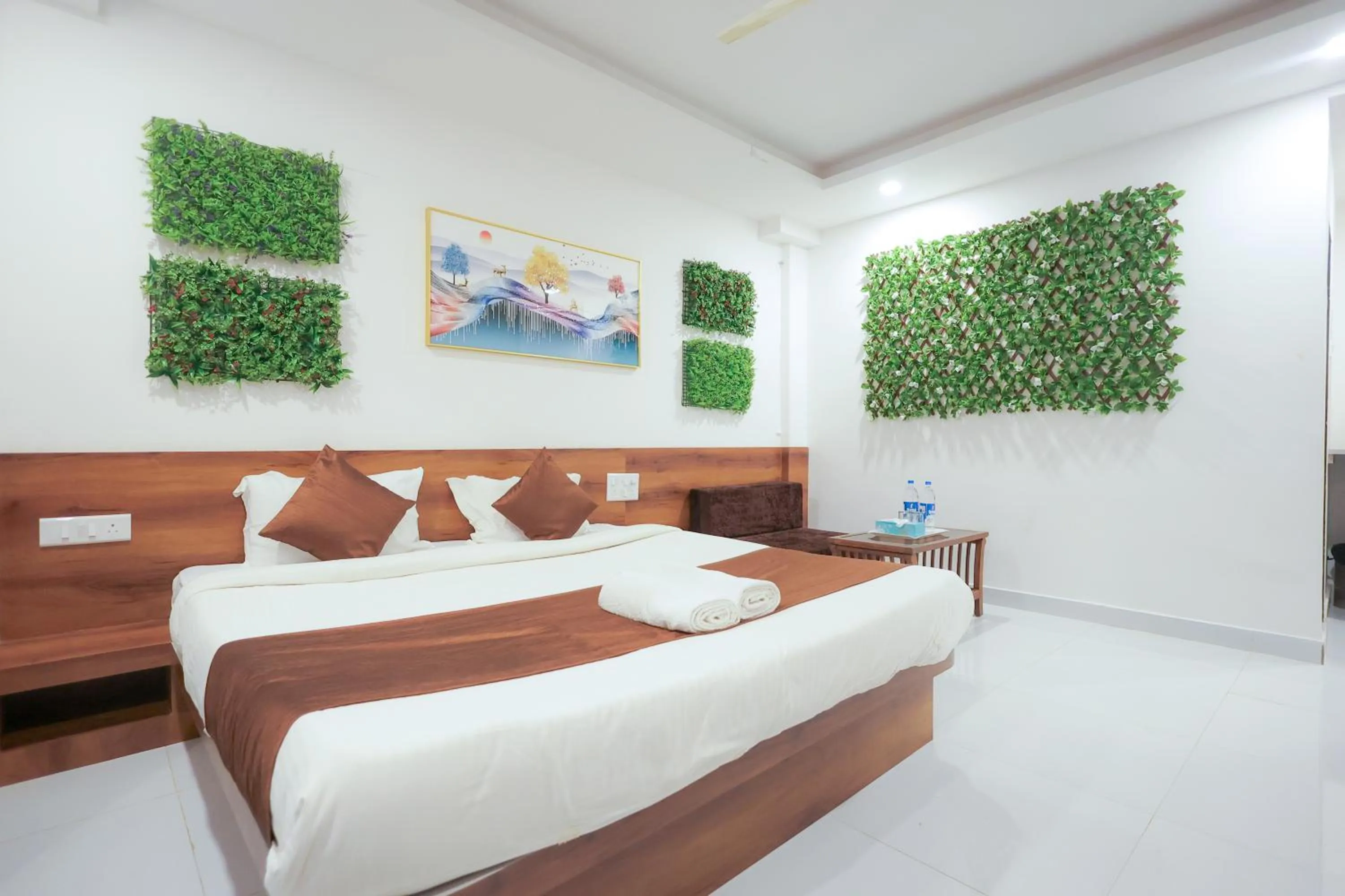 Bed in Hotel Green Exotica Mahabaleshwar