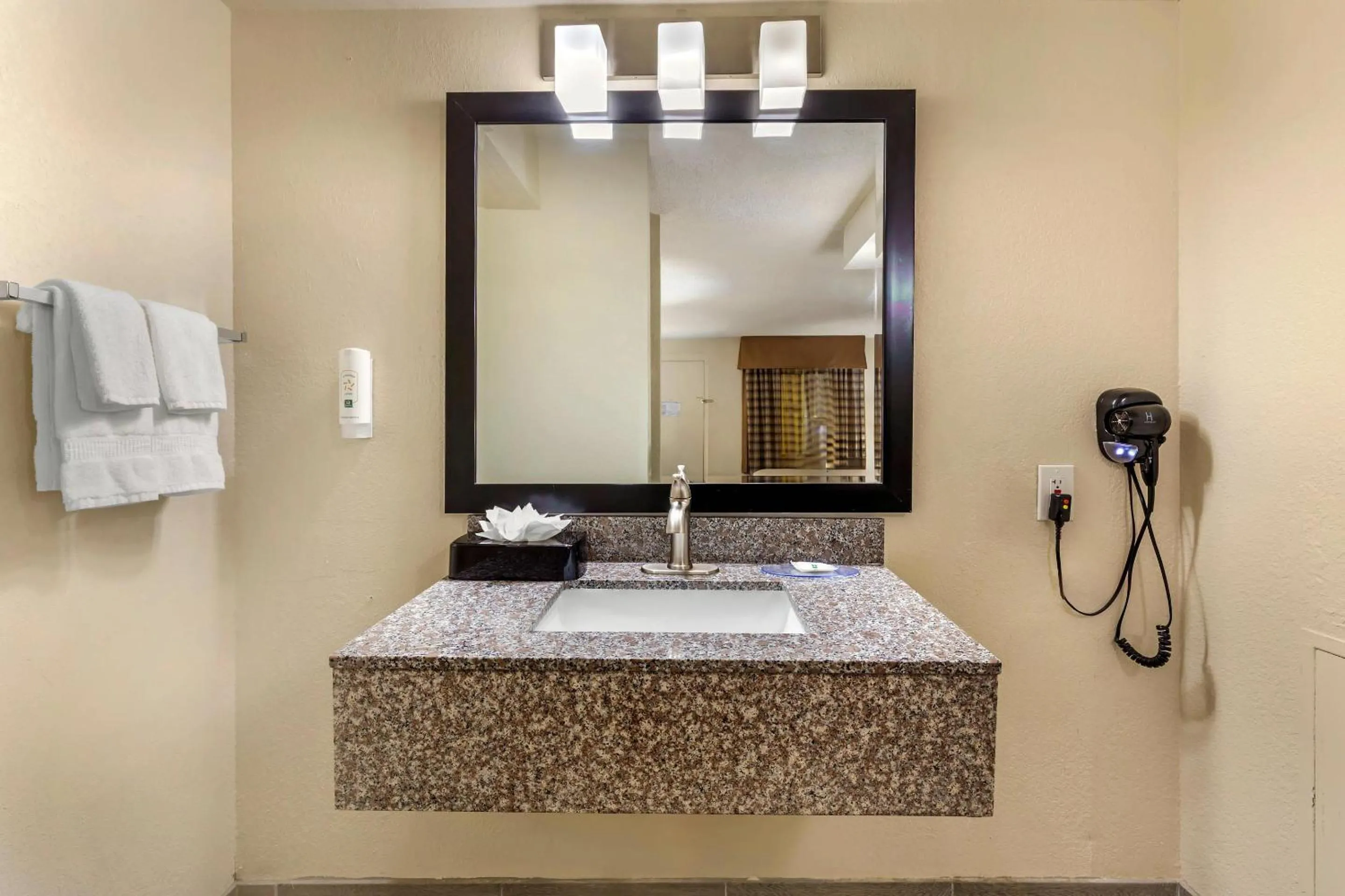 Bedroom in Quality Inn & Suites Spring Lake - Fayetteville near Fort Bragg